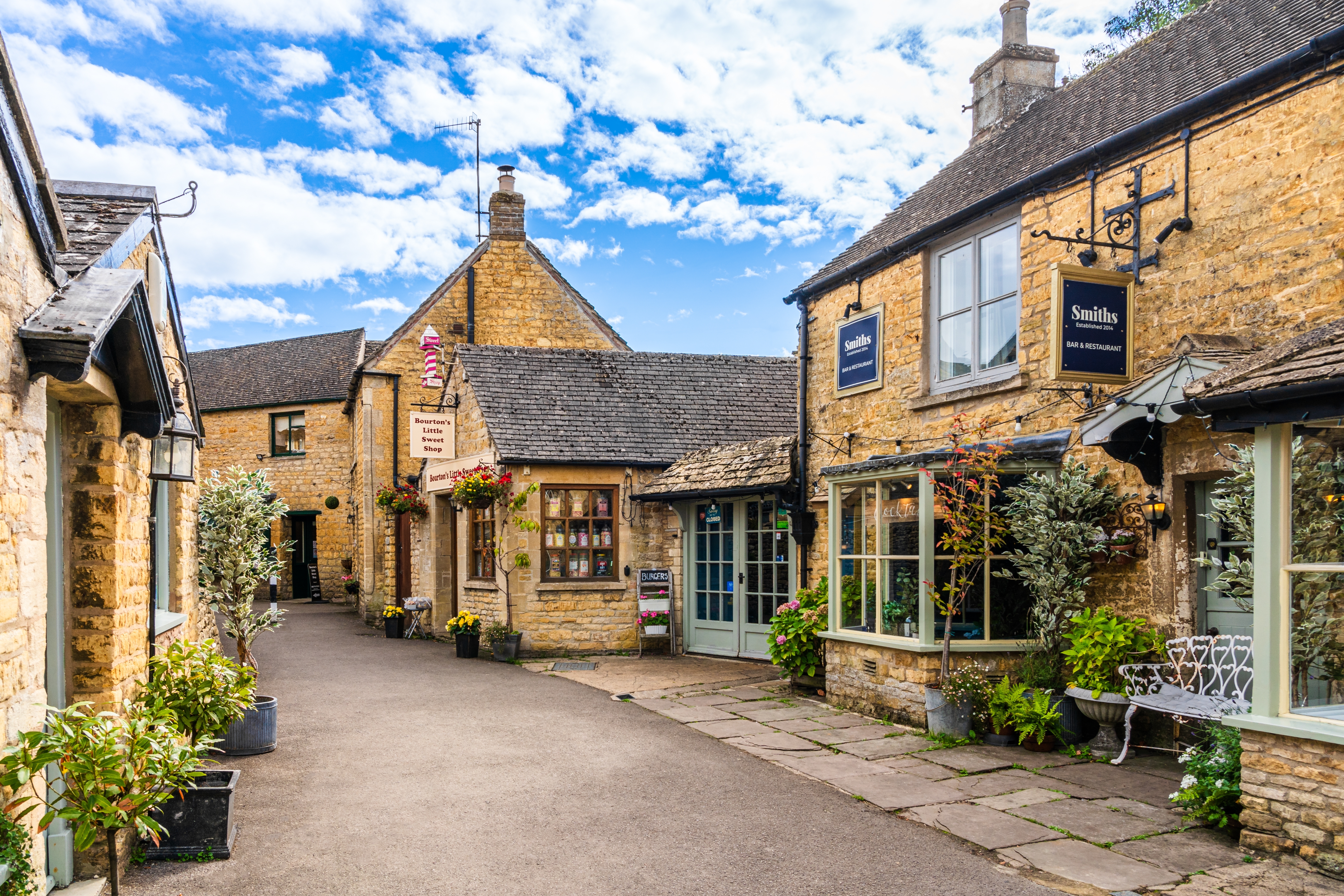Bourton-on-the-water,,Cotswolds,,England,,Uk,-,September,2021:,Shops,,Restaurants,And