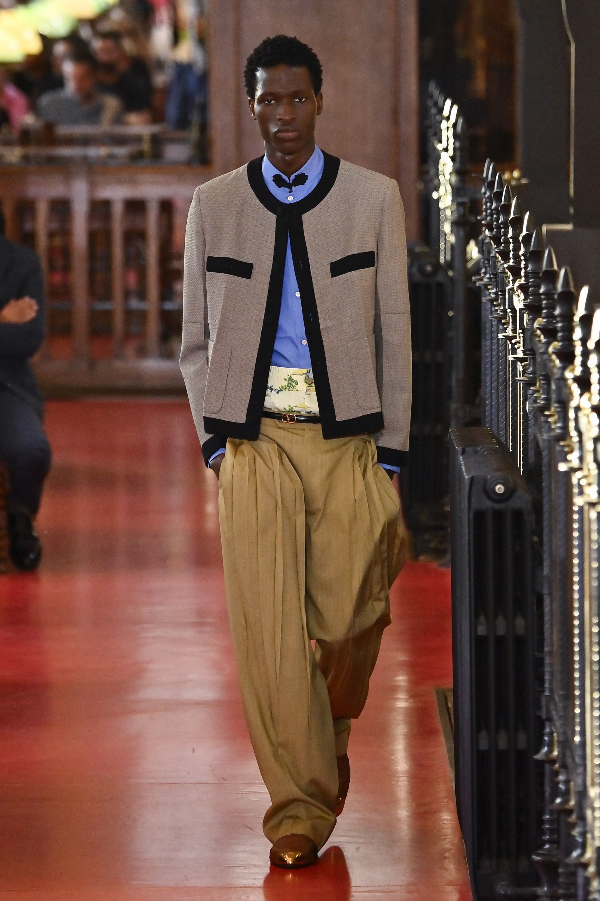 Micheal Okotie walks the catwalk at the Valentino