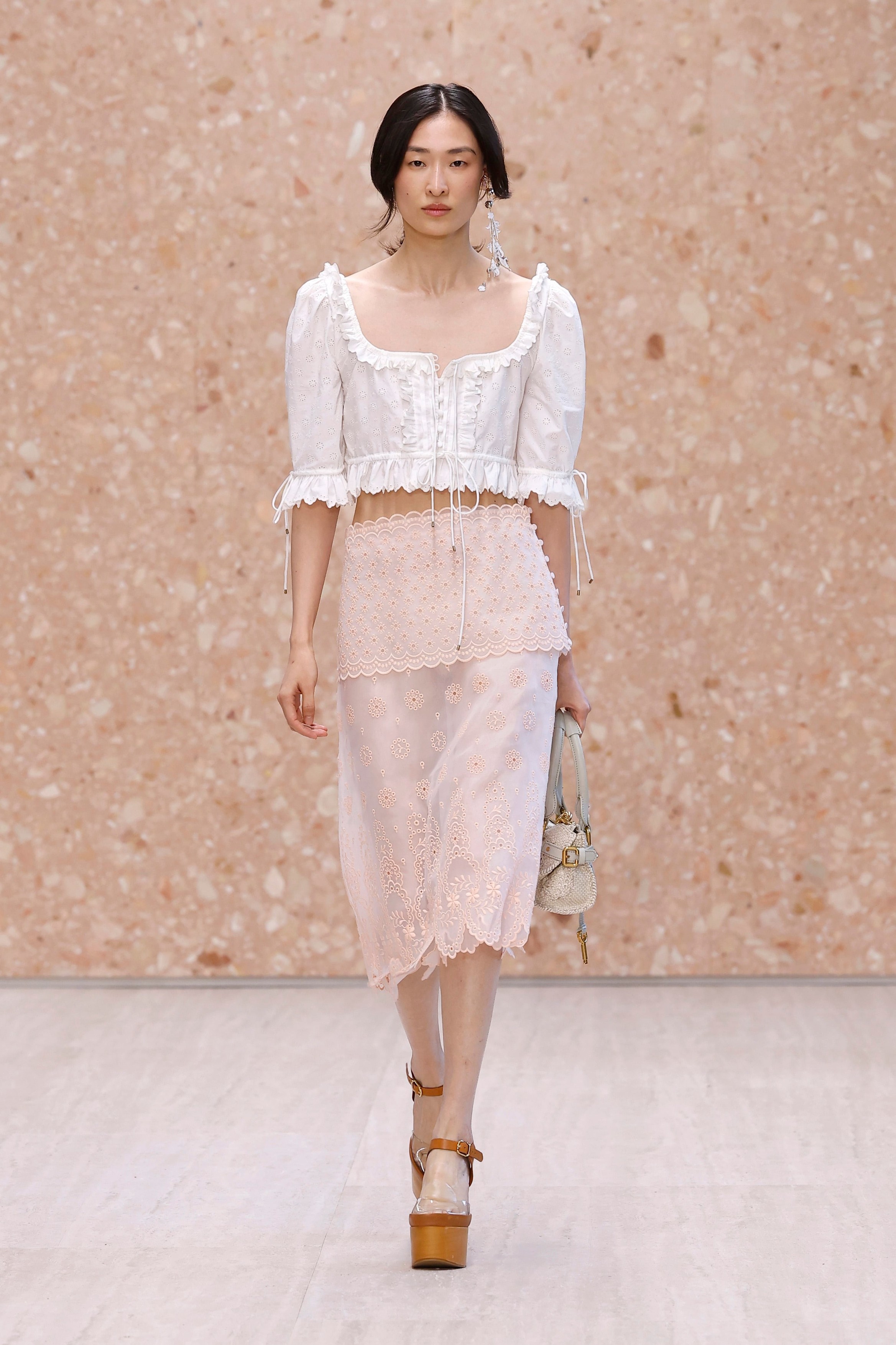Model on the runway at the Chloé fashion show in Paris