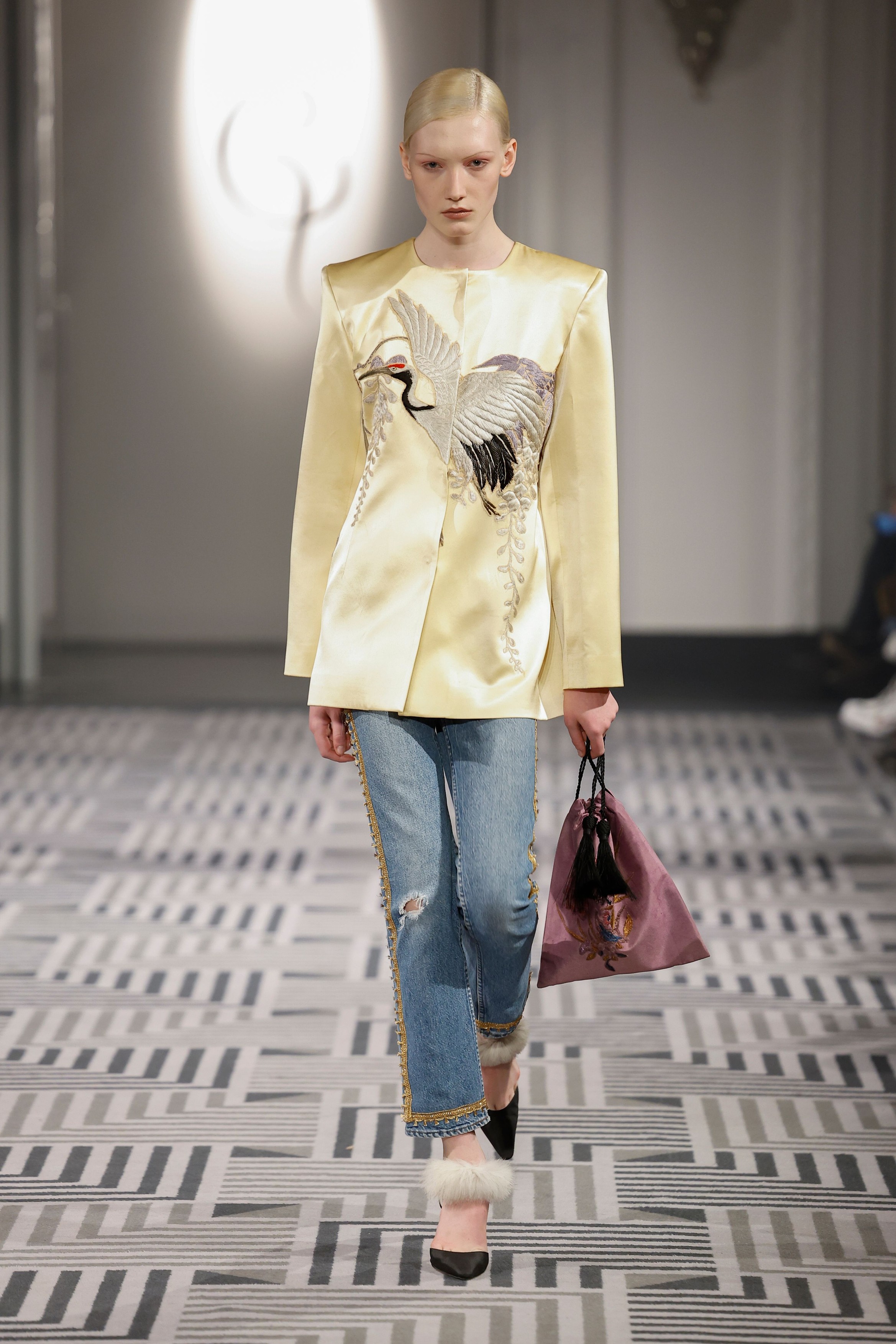 Model on the runway at the Conner Ives fashion show