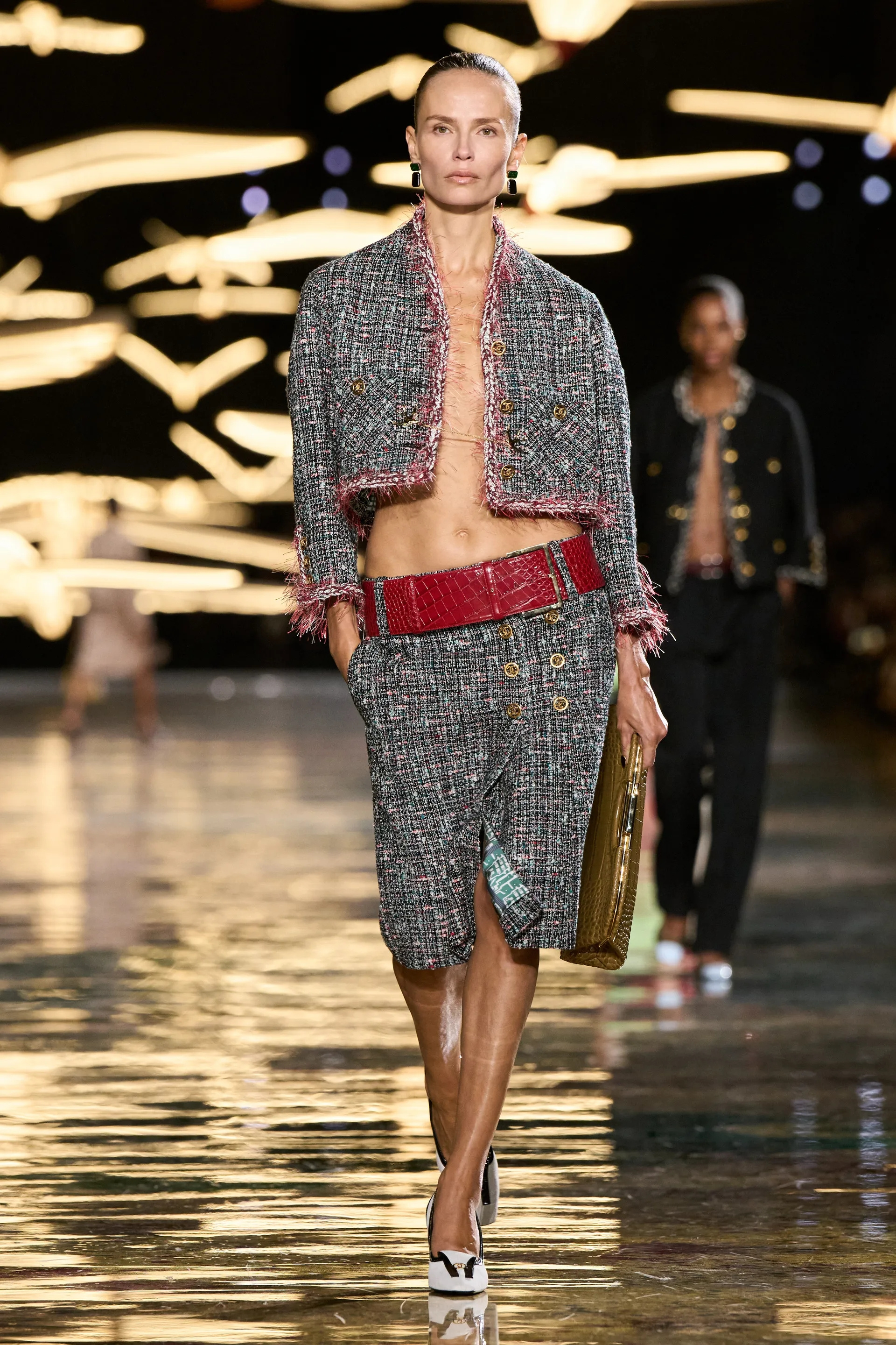 A model walks the runway at the Chanel show