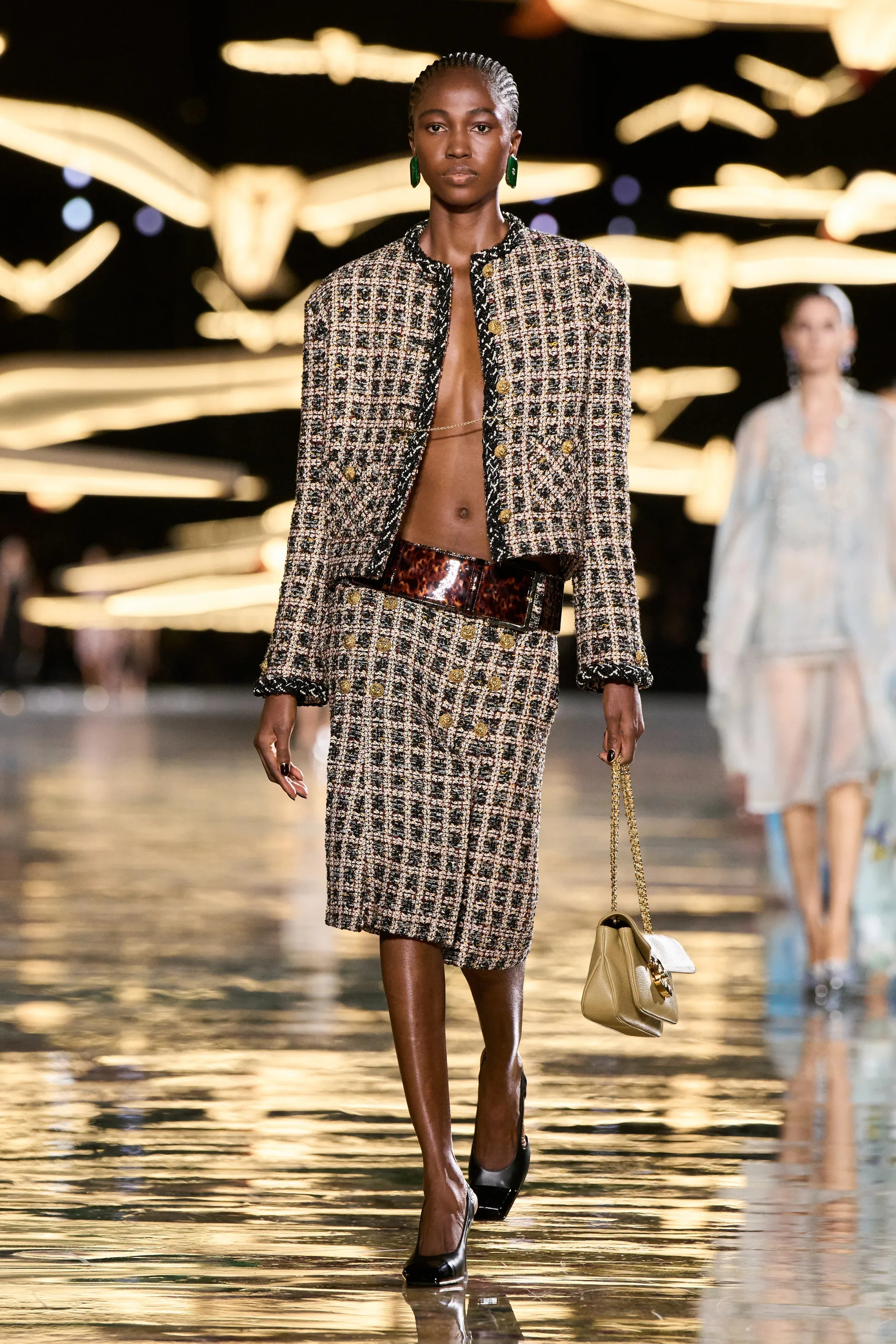 A model walks the runway at the Chanel show