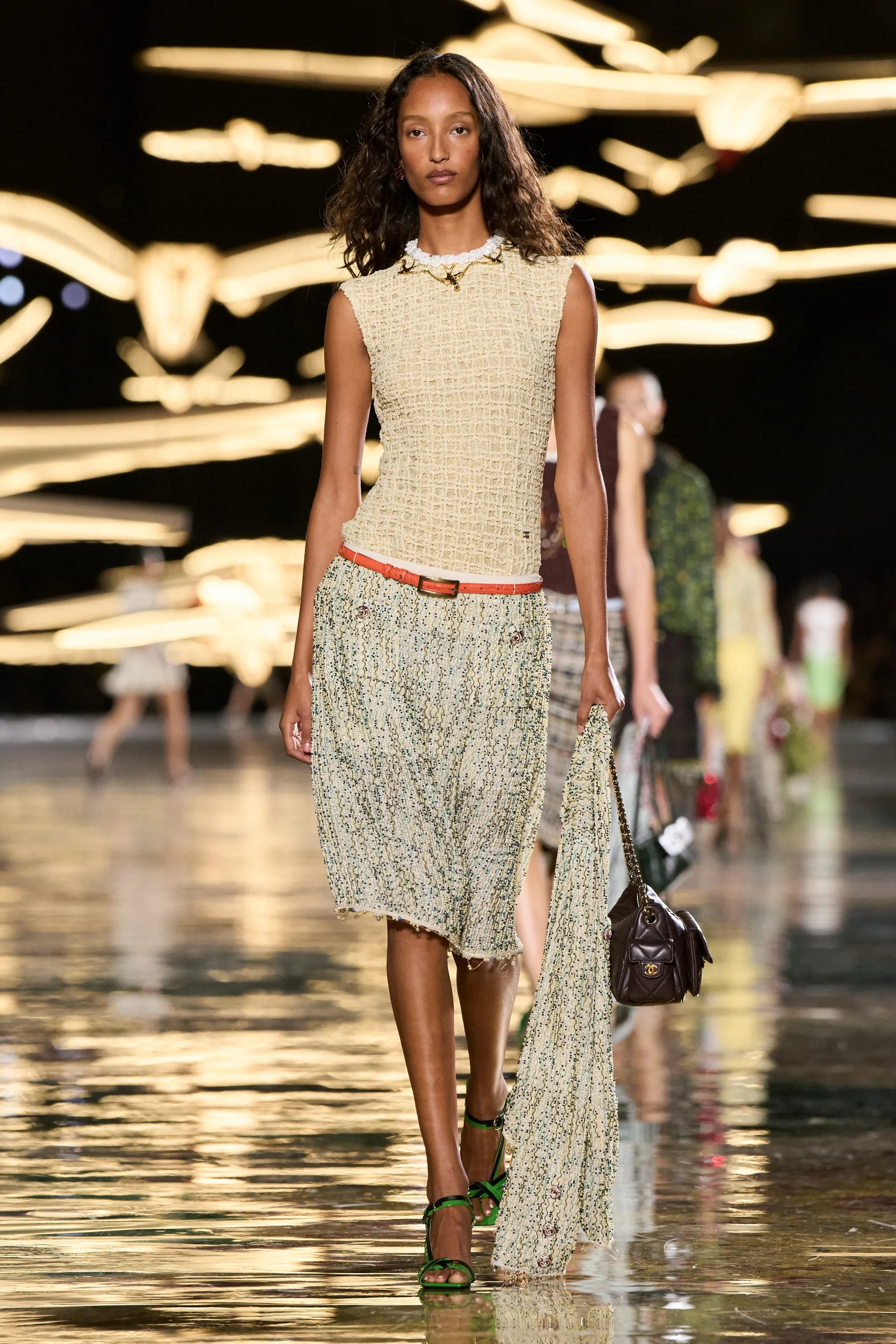 A model walks the runway at the Chanel show