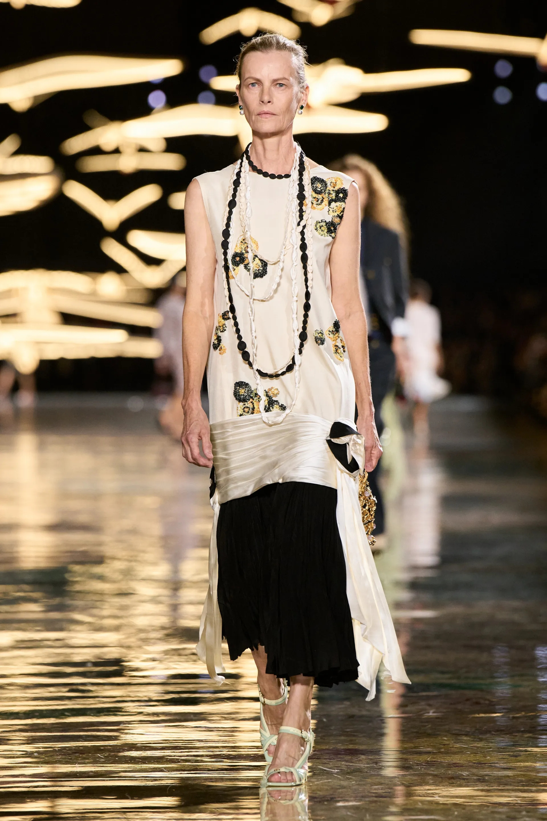 A model walks the runway at the Chanel show