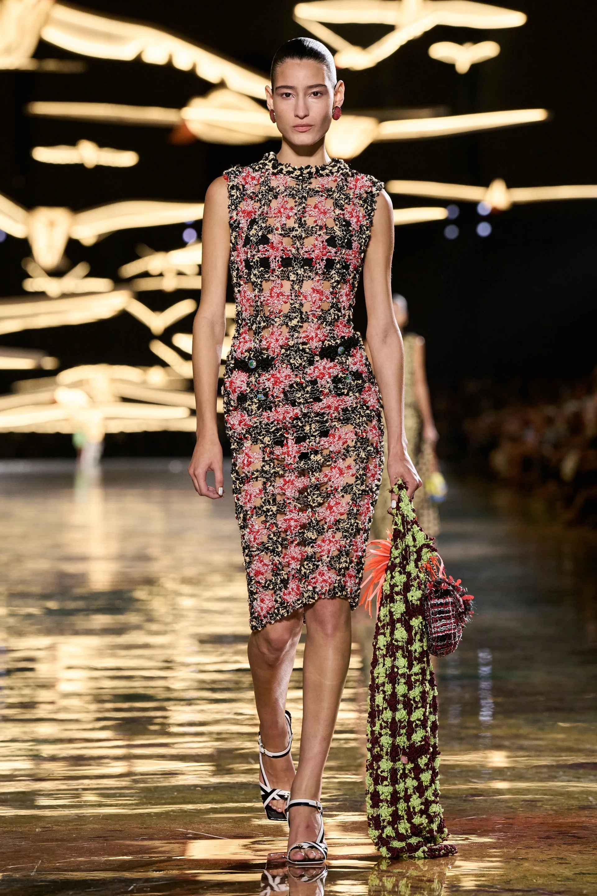 A model walks the runway at the Chanel show