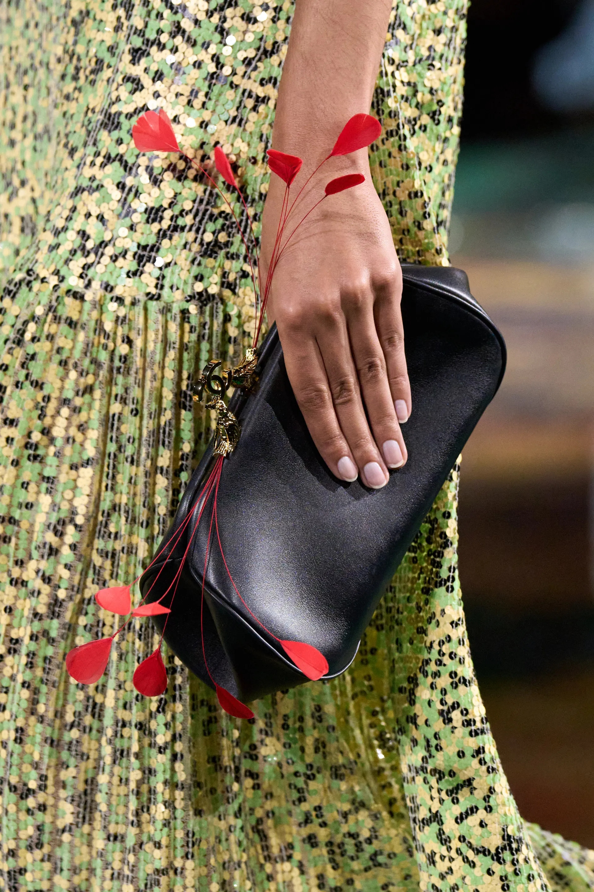 A model walks the runway at the Chanel Details show