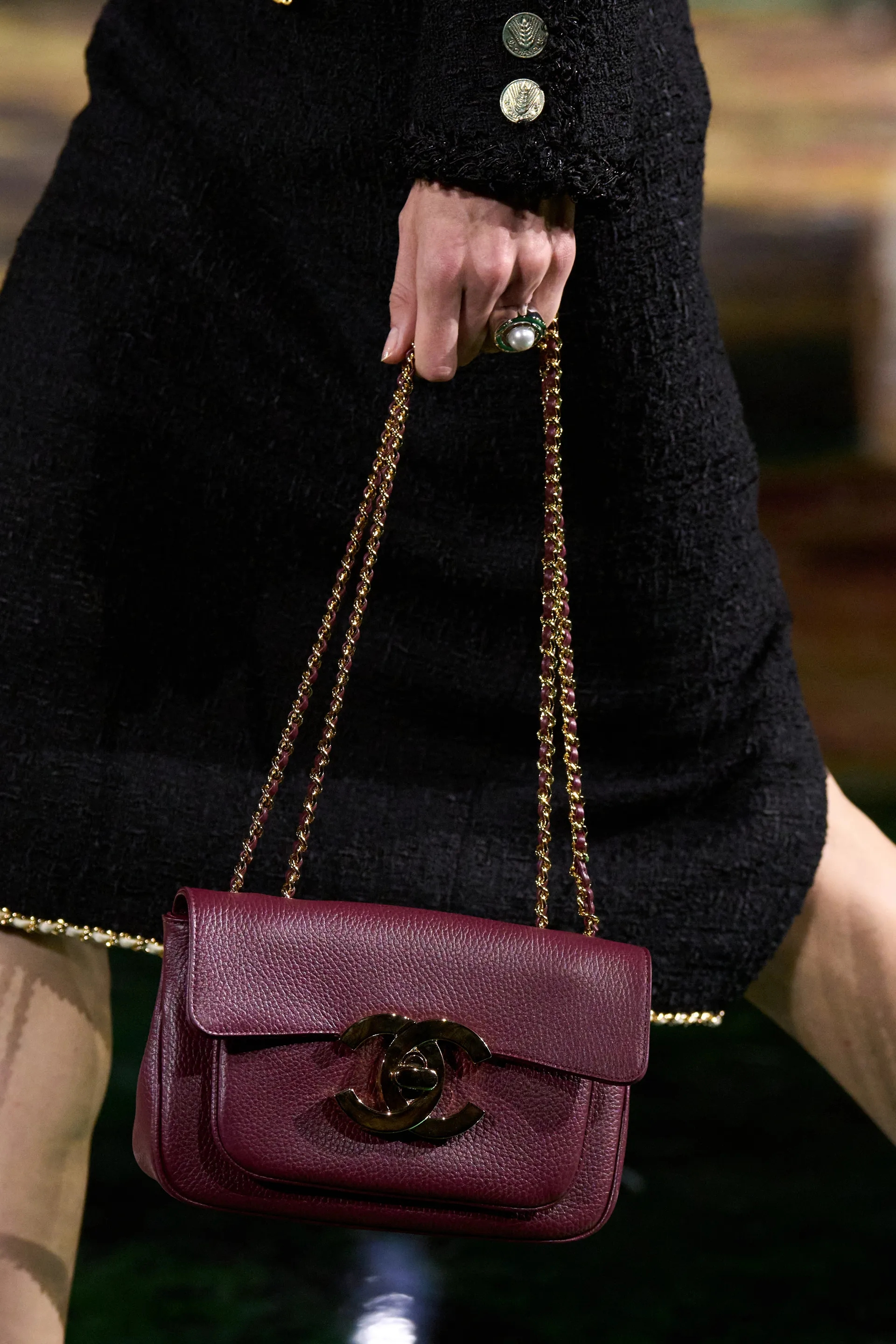A model walks the runway at the Chanel Details show