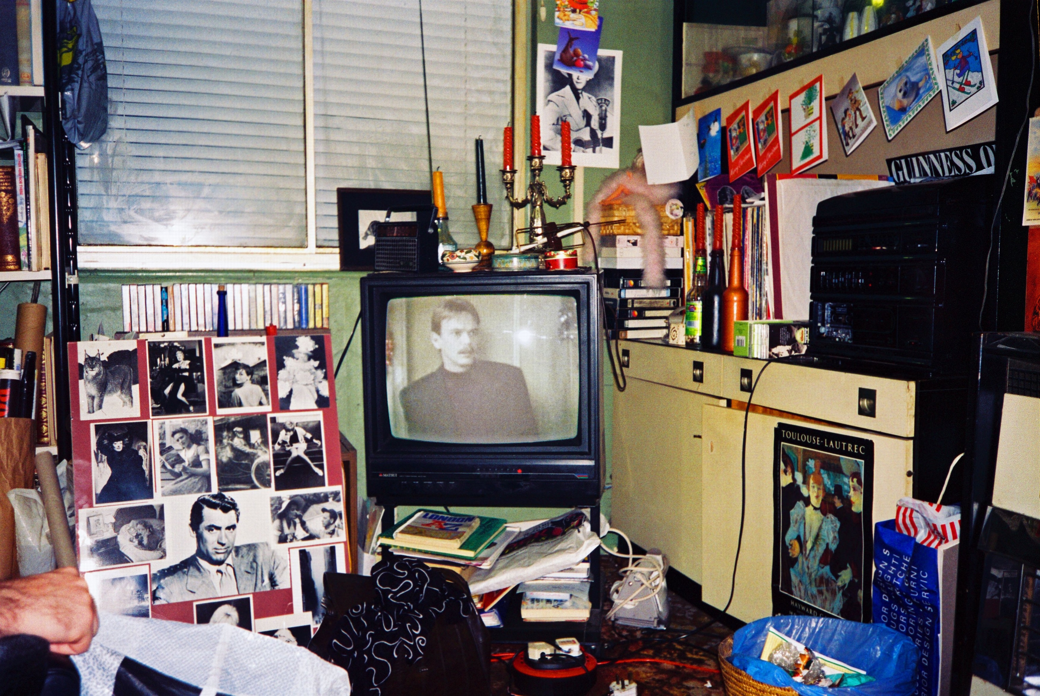 Room interior. Cluttered front room in a london home. Ian Beale from eastenders vs Cary Grant the film star!