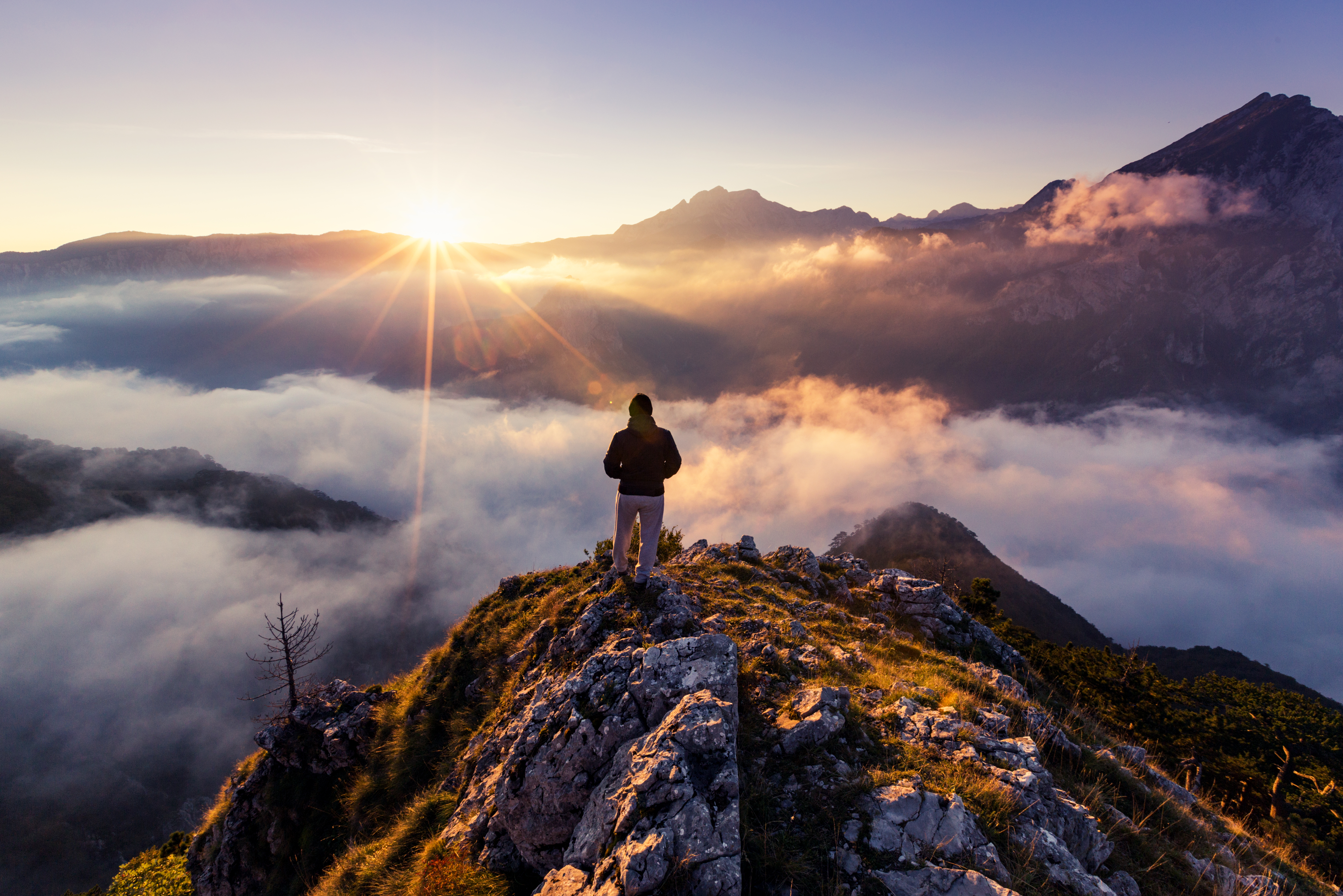 Successful,Man,Hiker,On,Top,Of,Mountain