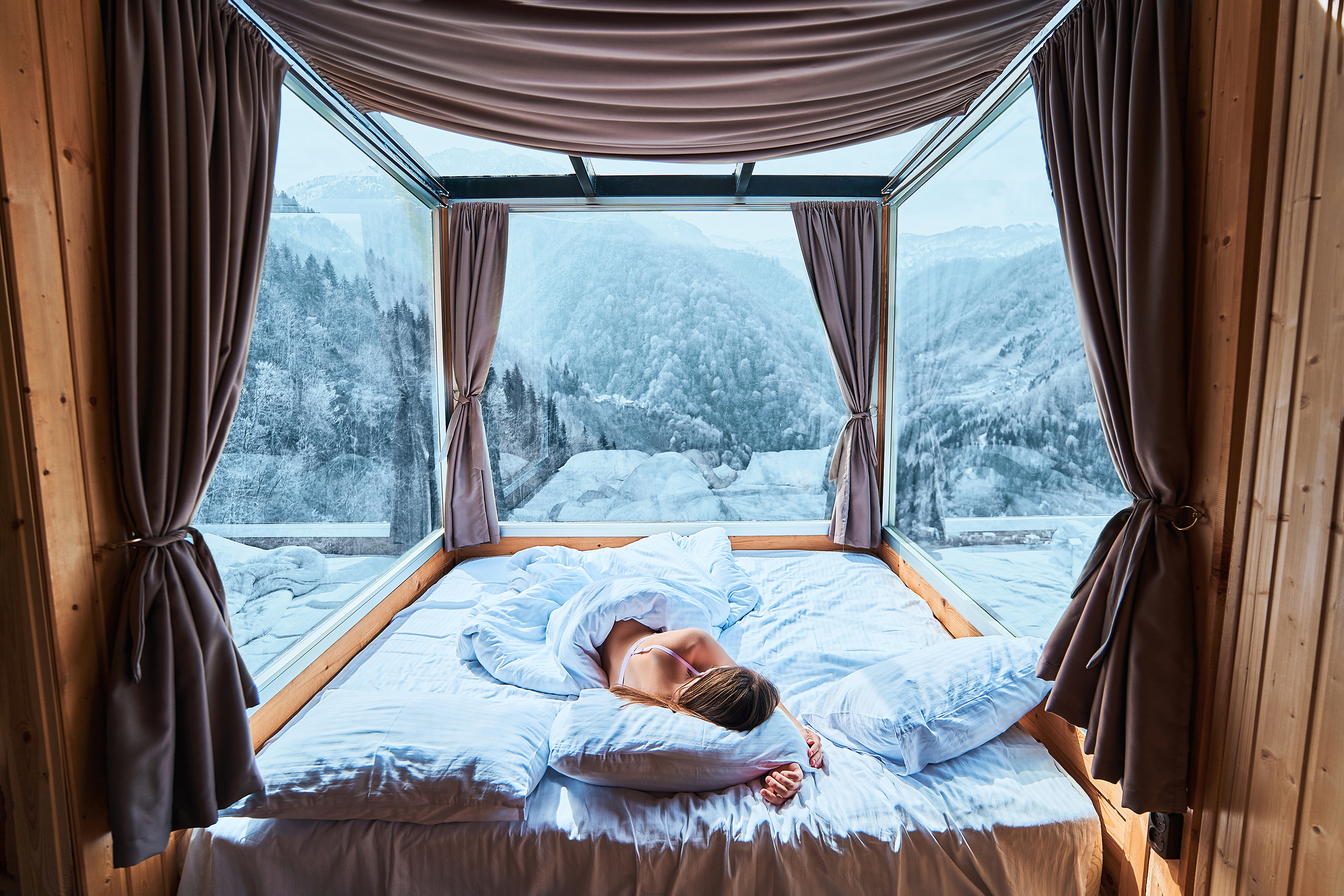 Tranquil,Serene,Calm,Woman,Sleeping,On,A,Soft,White,Cozy