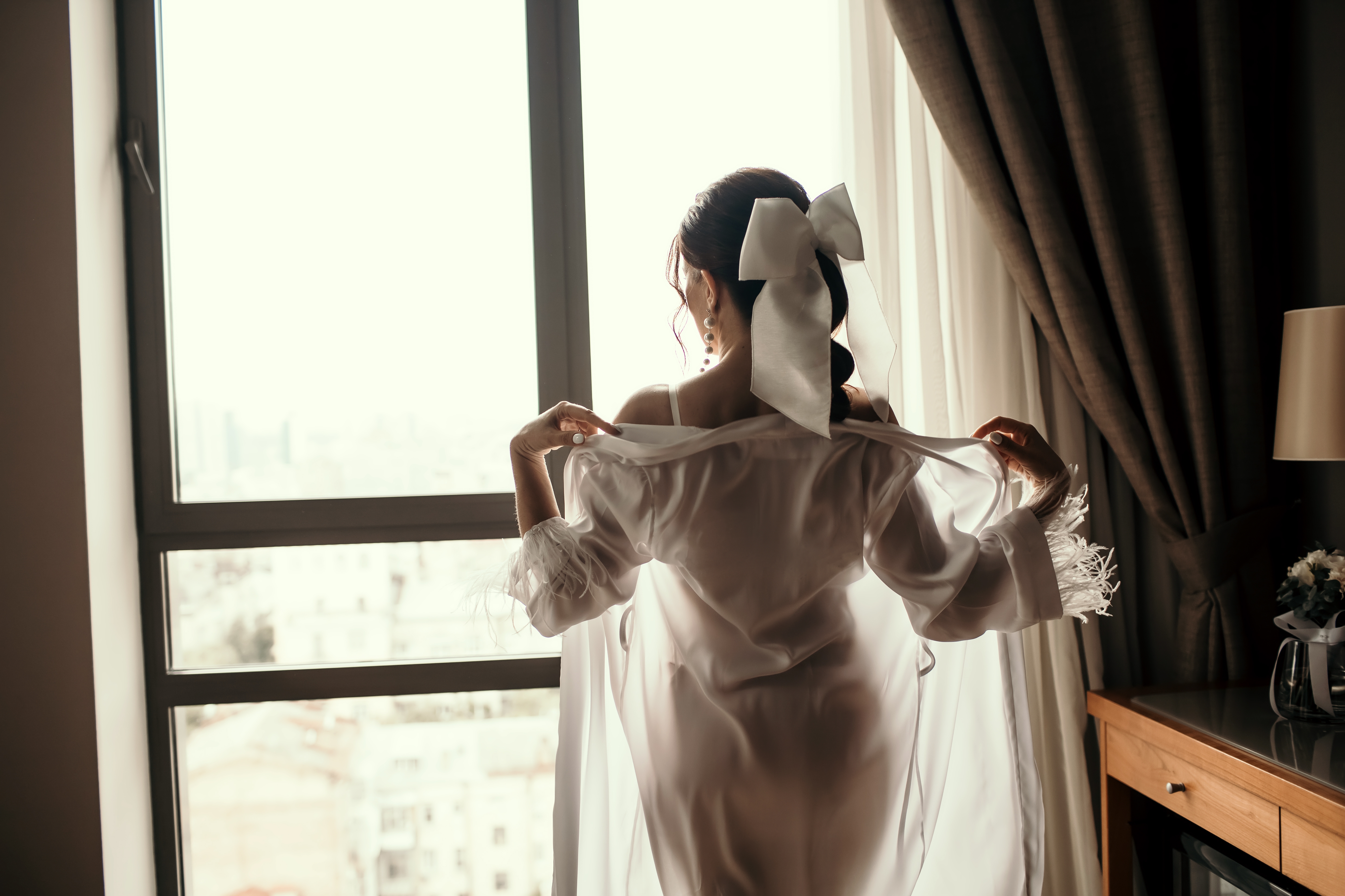 A,Brunette,Woman,Takes,Off,Her,White,Transparent,Robe,In