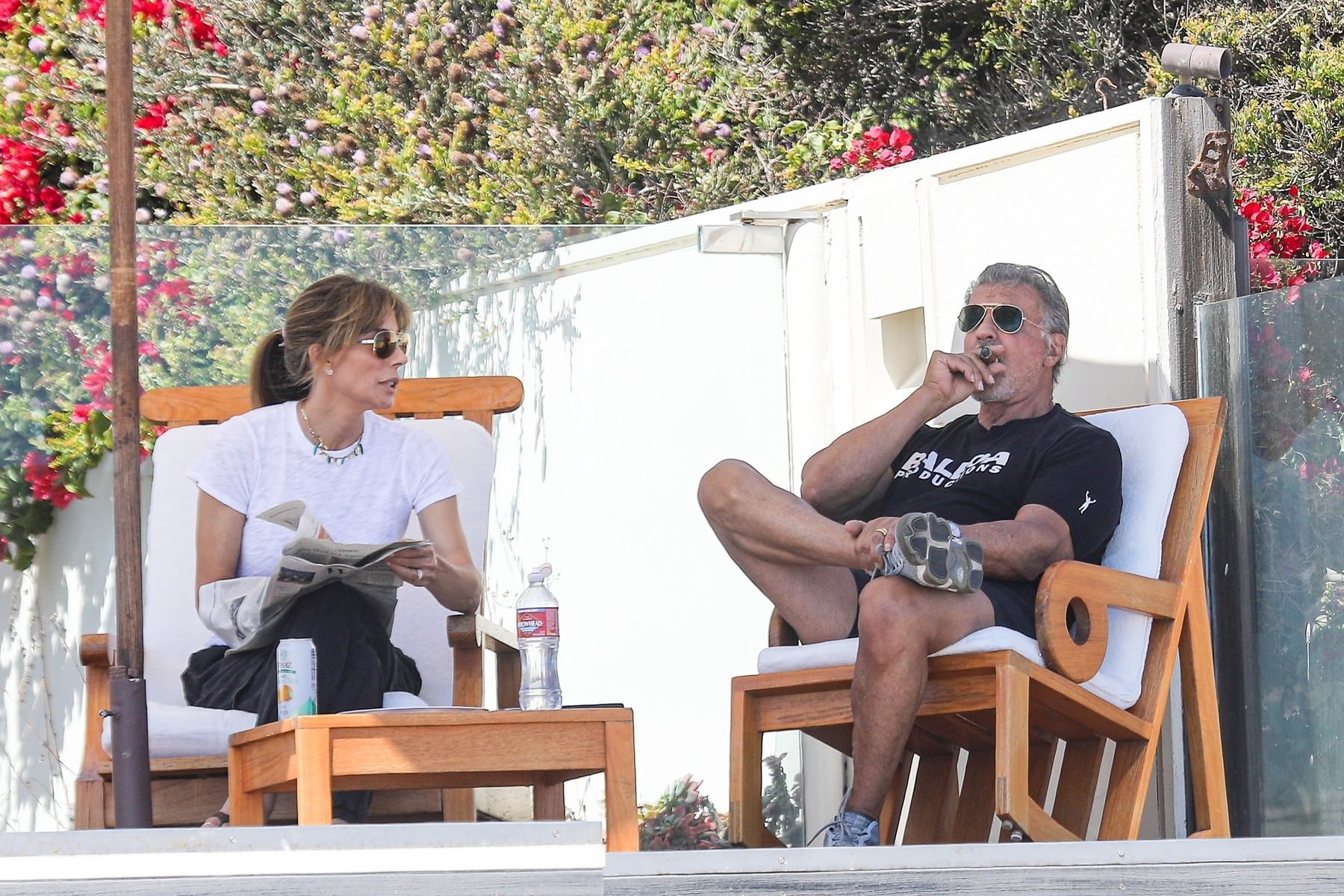 *EXCLUSIVE* Sylvester Stallone enjoys a cigar while chilling on his balcony