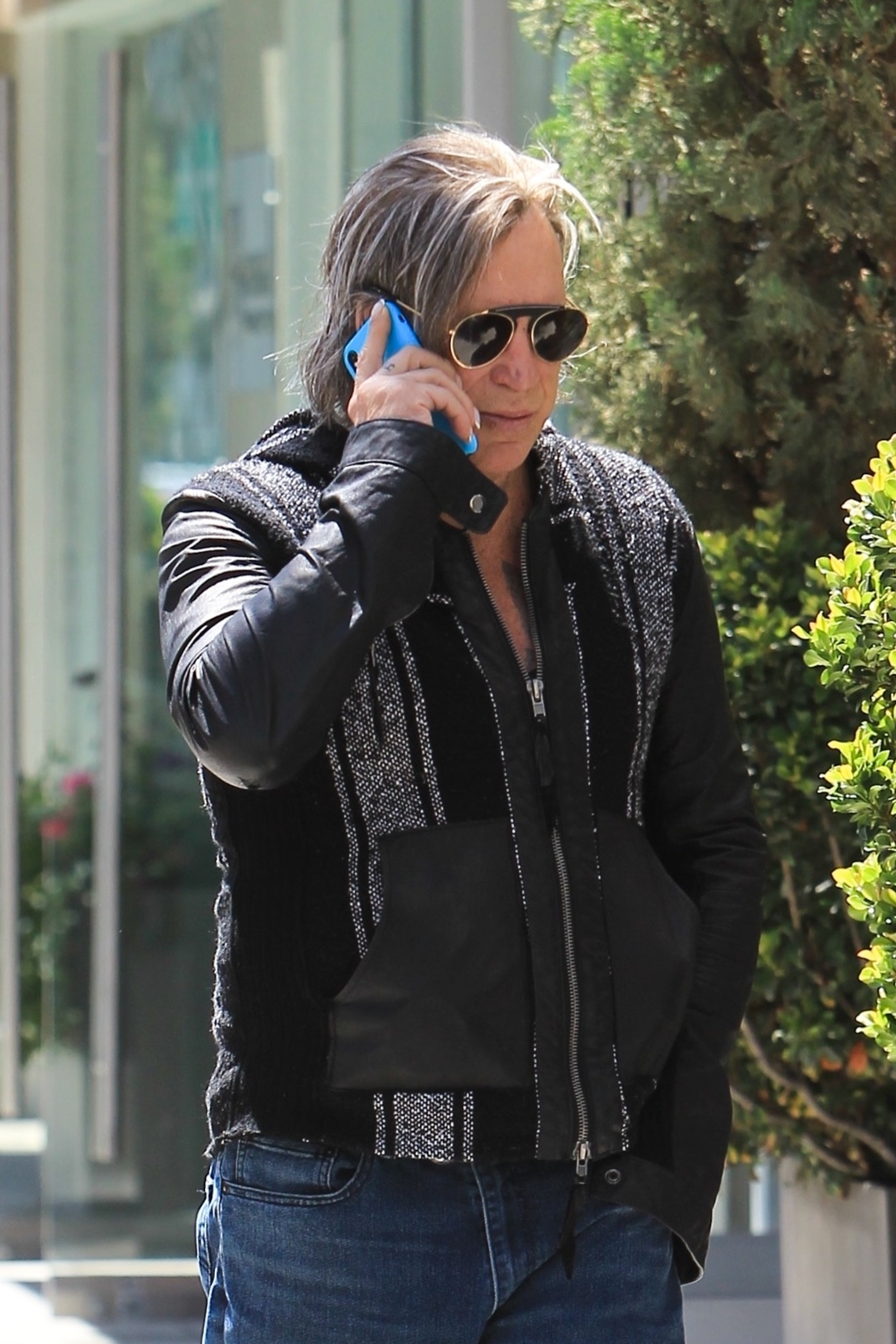 Mickey Rourke goes shopping with his assistant  in Beverly Hills