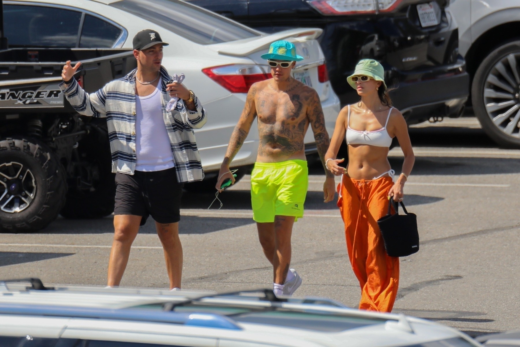 *EXCLUSIVE* Justin and Hailey Bieber hit the beach before taking off in a Ford Bronco - ** WEB MUST CALL FOR PRICING **