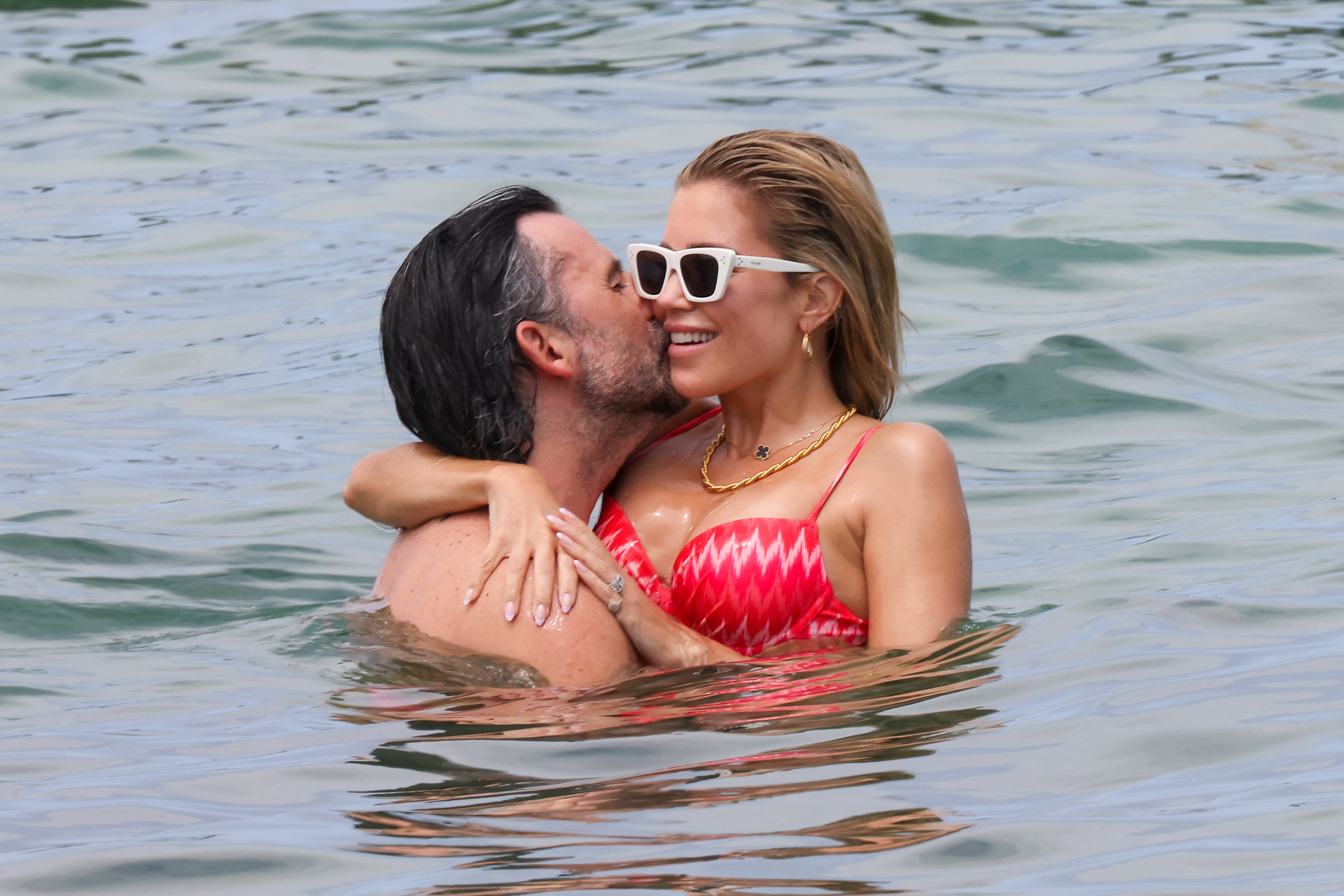 Sylvie Meis and husband Niclas Castello during a beach day in Saint Tropez