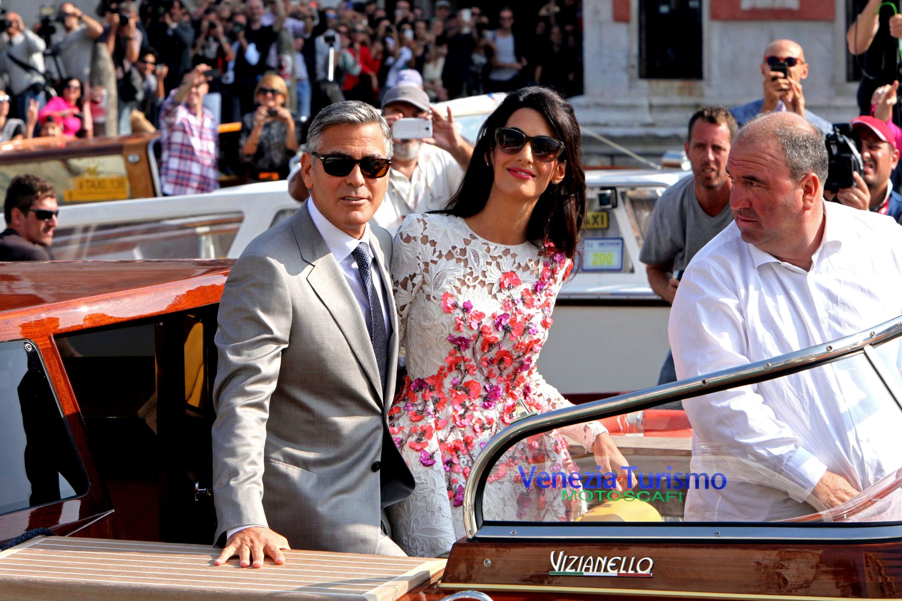 JUST MARRIED! George Clooney and Amal Alamuddin board a water taxi as they make their first appearance as husband and wife