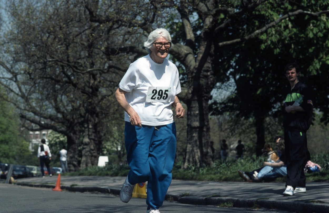 Old woman participating in a fun run