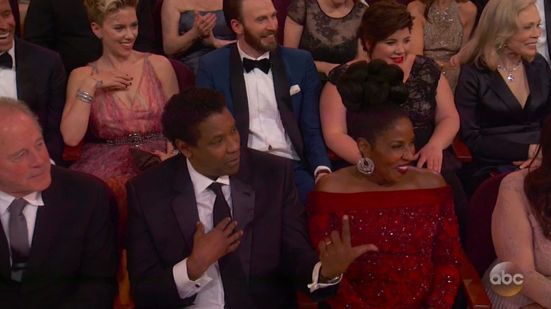 Denzel Washington 'marries' couple from Chicago as Hollywood tour bus group treated to surprise A-list meet and greet at Oscars