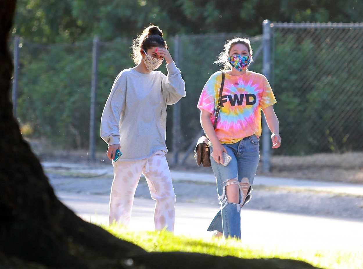 *EXCLUSIVE* Selena Gomez goes out for a short walk with a friend