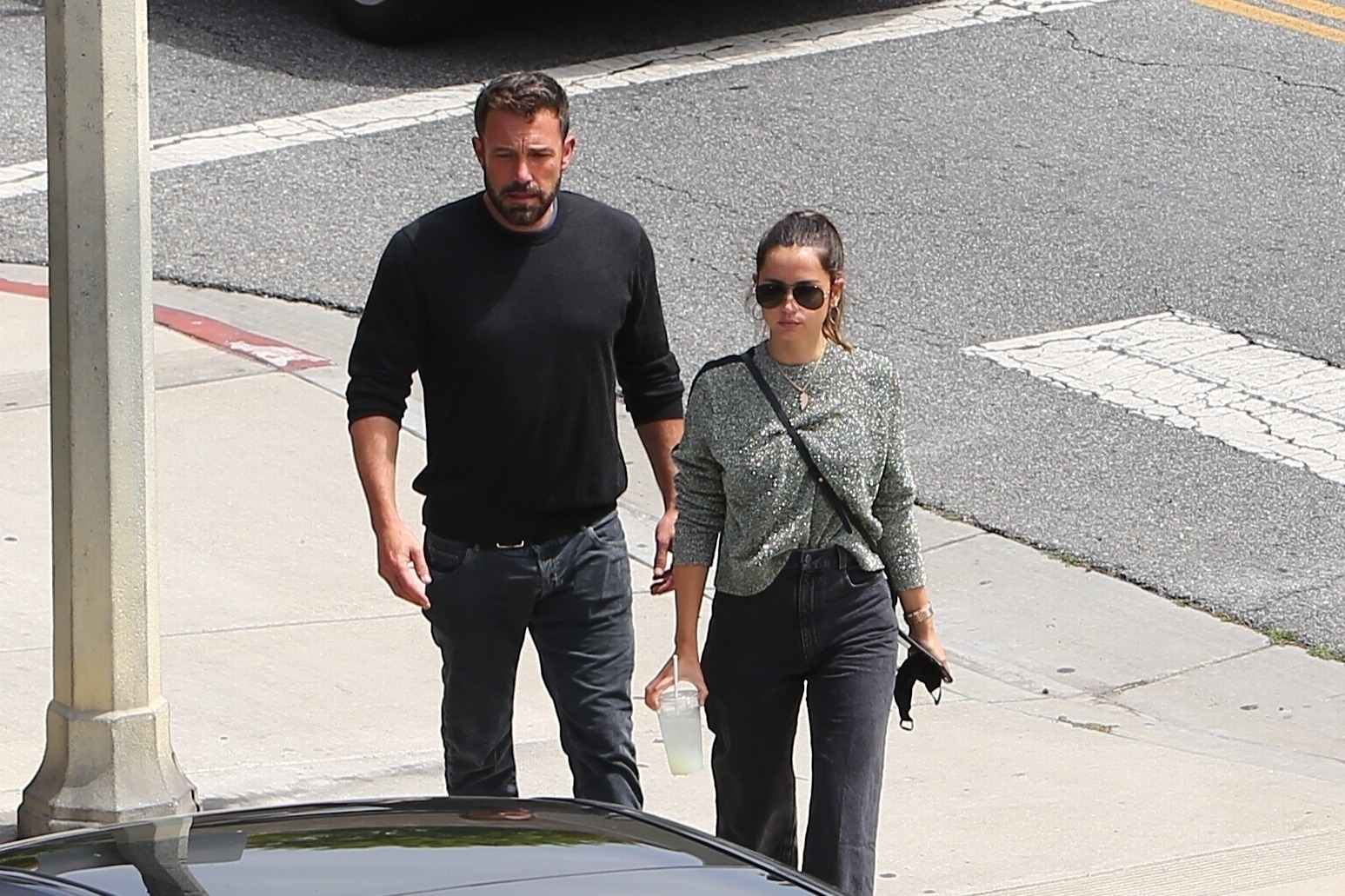 Ben Affleck and Ana de Armas are surrounded by shutterbugs after lunch at the Brentwood Country Mart
