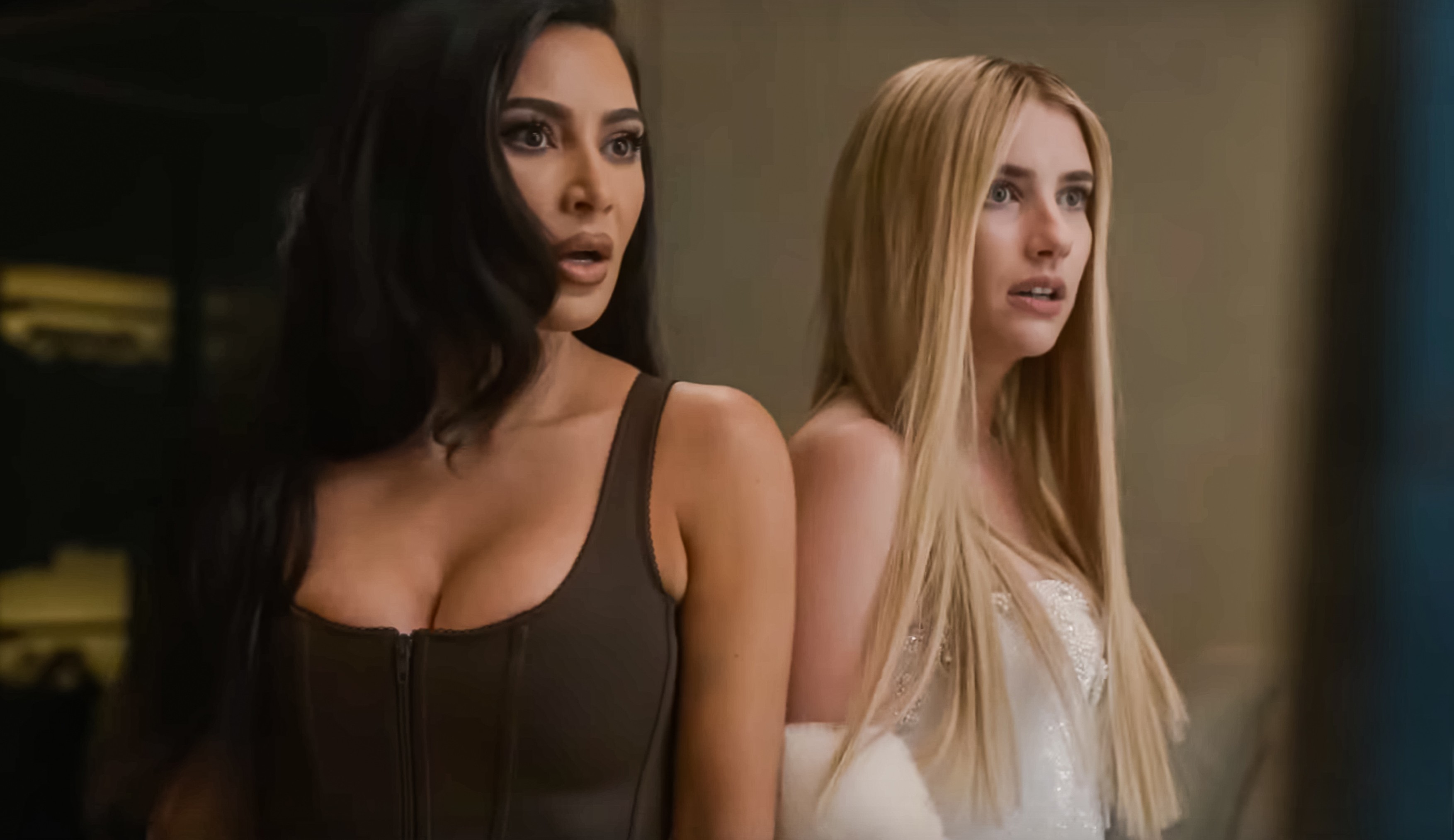 Kim Kardashian and Emma Roberts