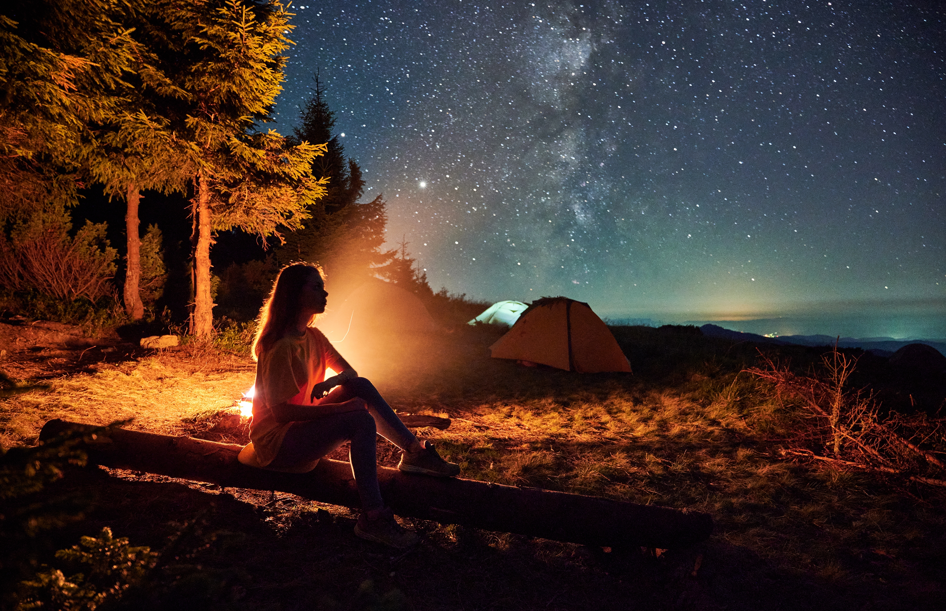 Side,View,Of,Silhouette,Of,Woman,Relaxing,Near,Forest,In