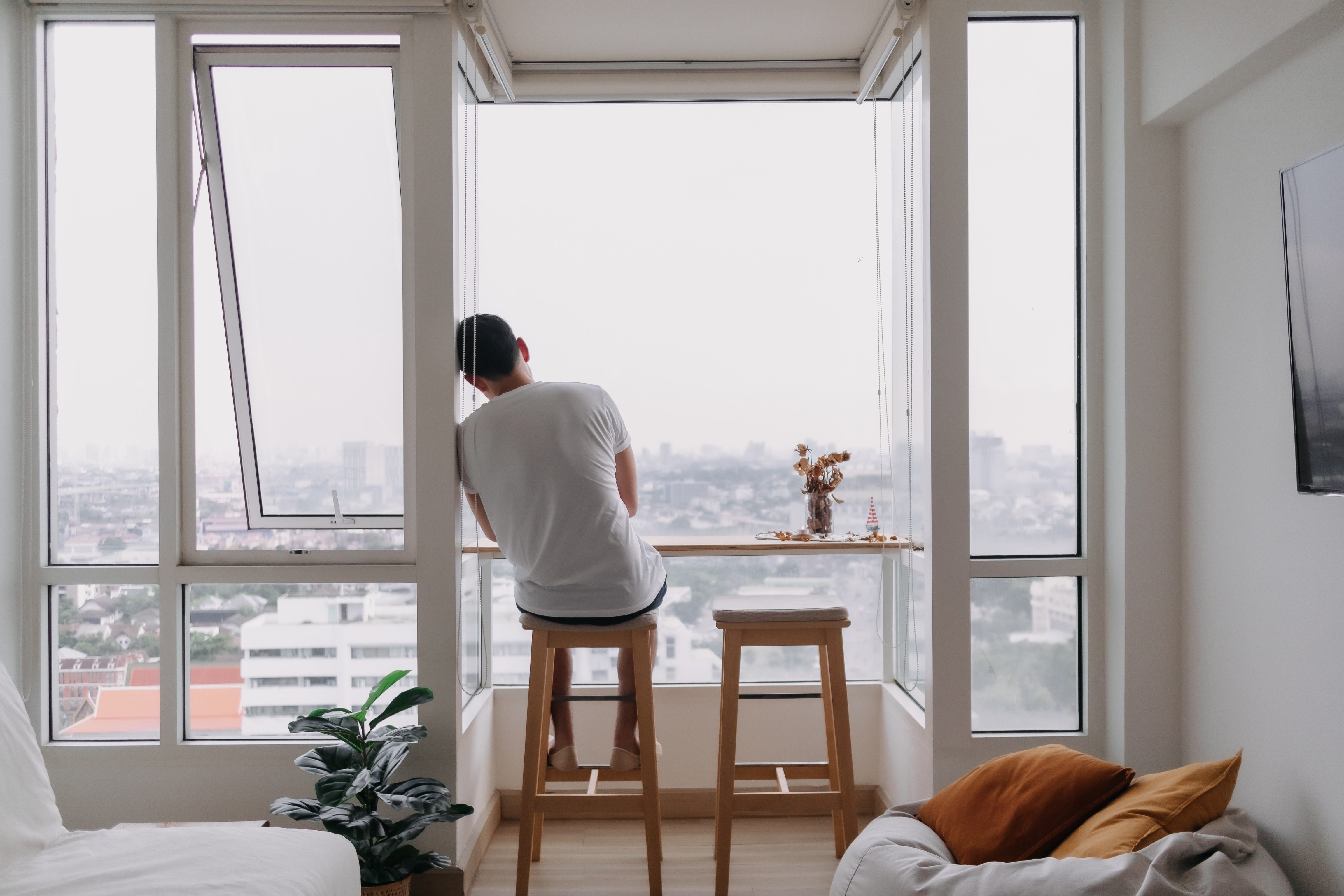 Lonely,Asian,Man,Sit,By,Windows,In,The,Room.,Concept