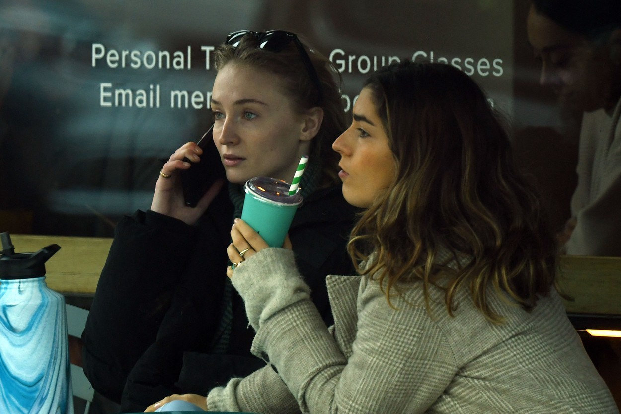 EXCLUSIVE: Sophie Turner enjoyed a girls’ afternoon out with close friend Tabitha Doherty - then they puckered up for a full-on kiss goodbye