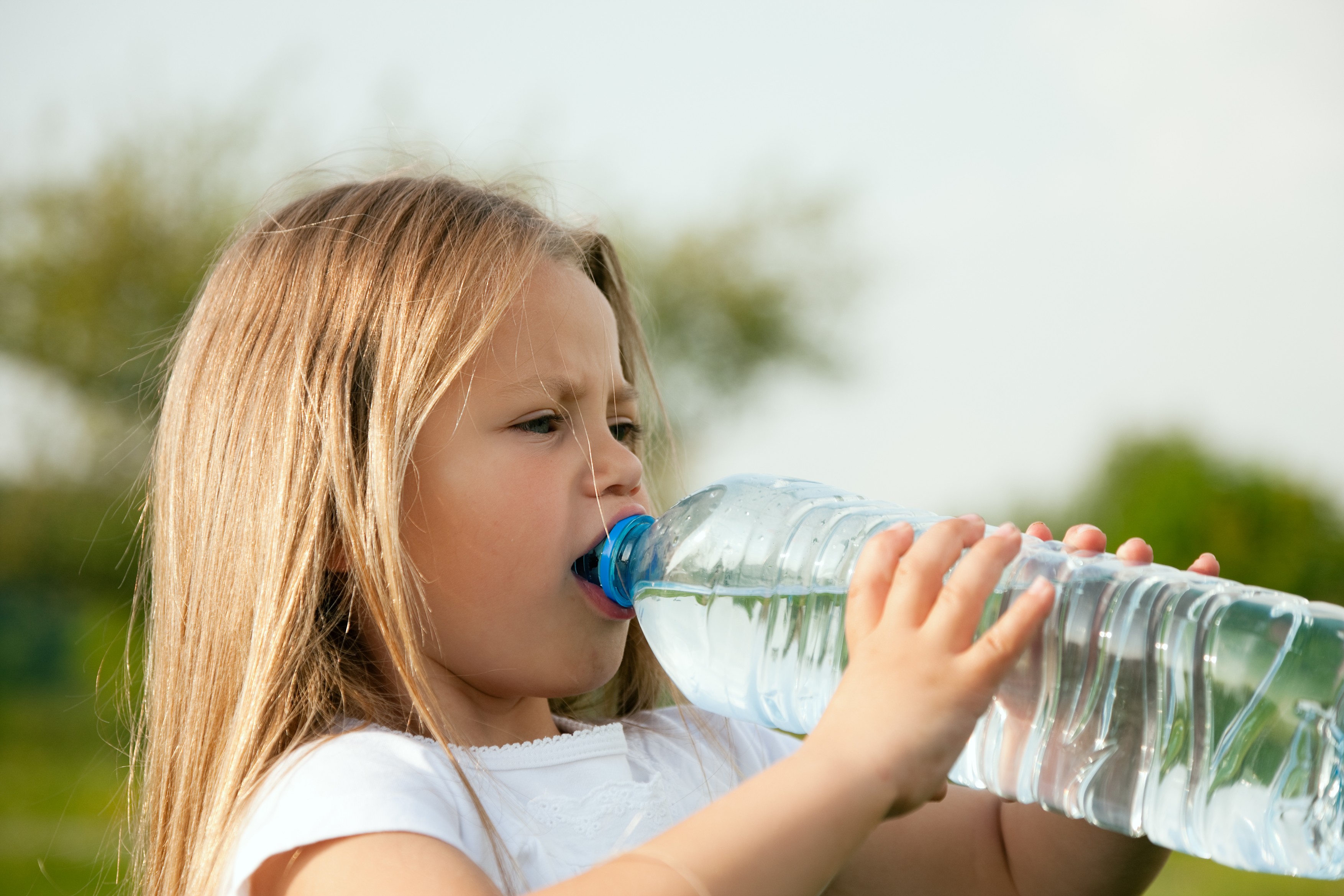 child drinks water