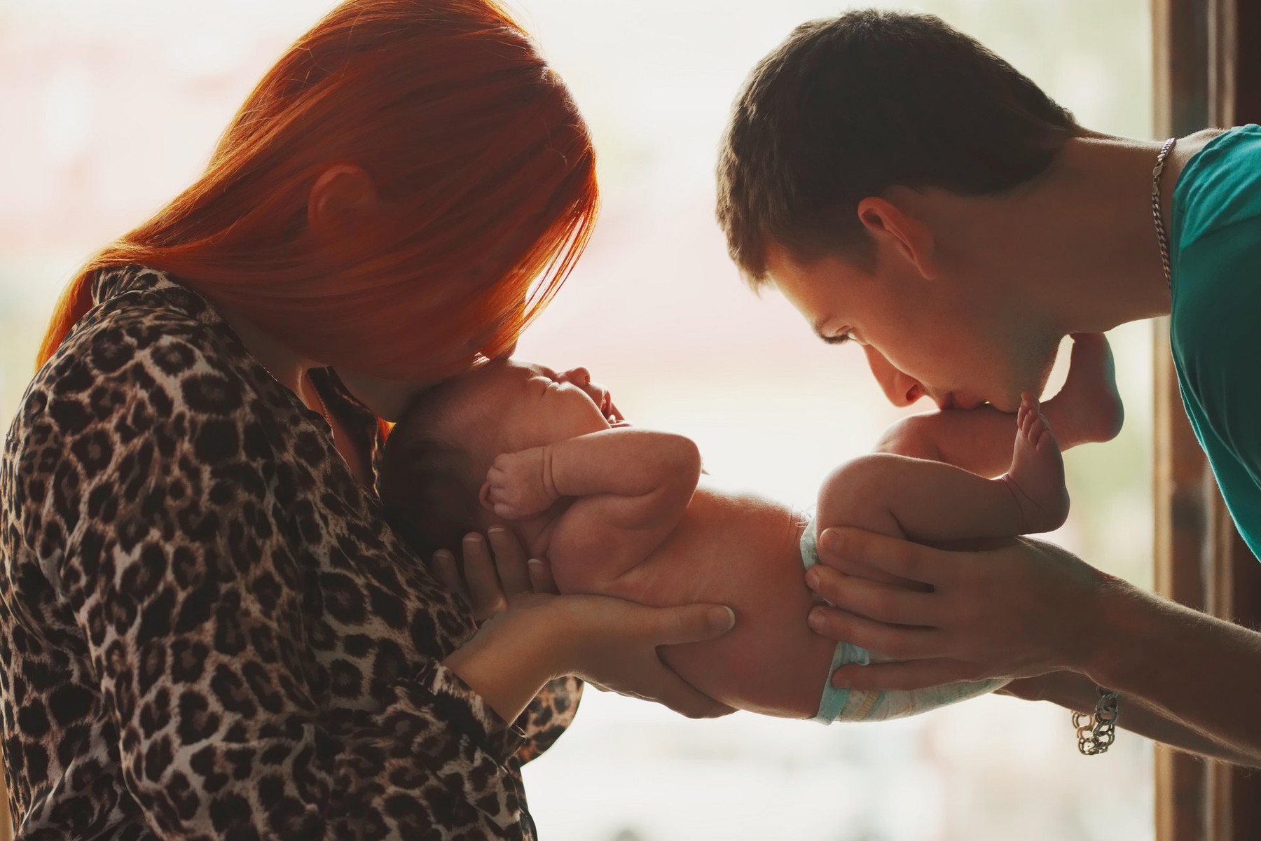 happy parents with their newborn baby