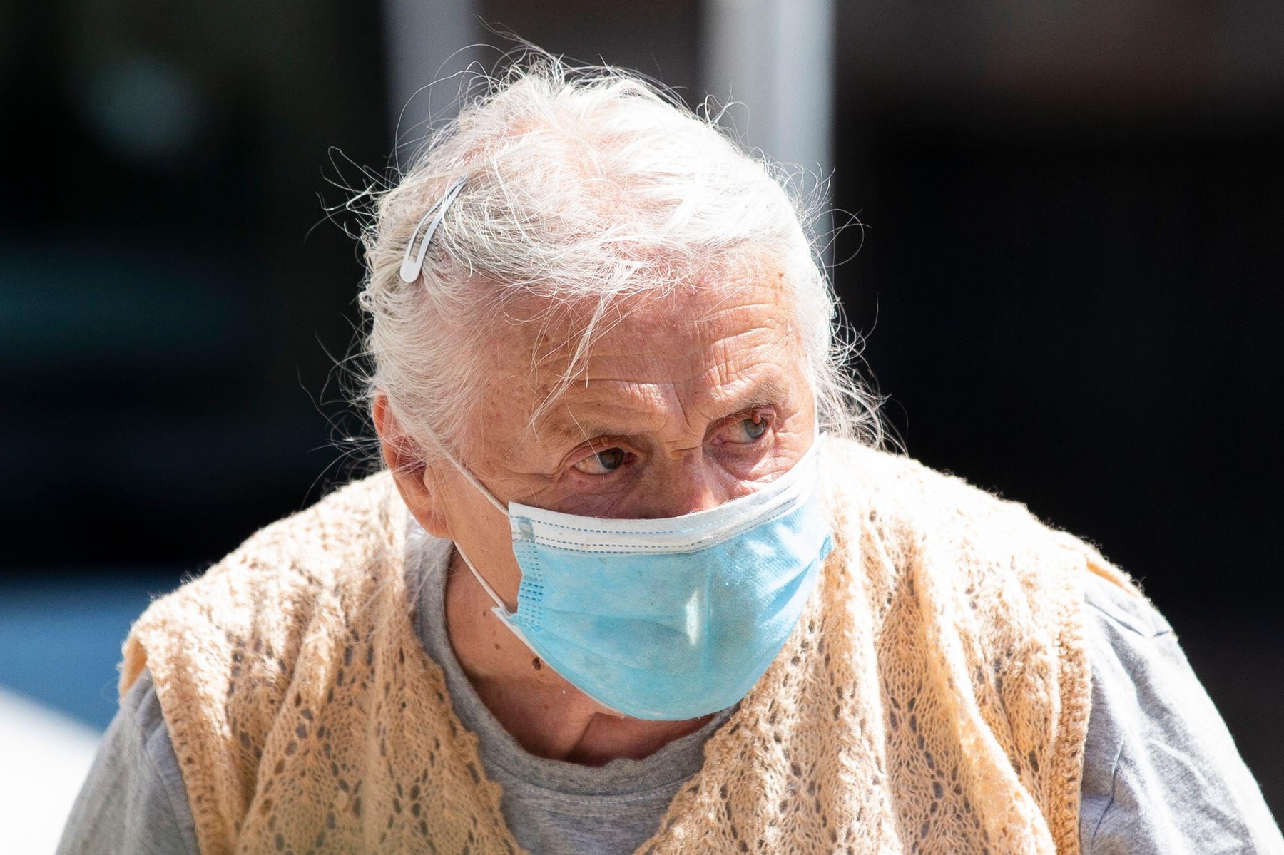 Belgrade, Serbia. 8th July, 2020. An old woman with mask walks through the city during the new Coronavirus Lockdown (COVID-19) after the increase of coronavirus infected in Belgrade, Serbia on July 8, 2020. The number of coronavirus infections is increasi