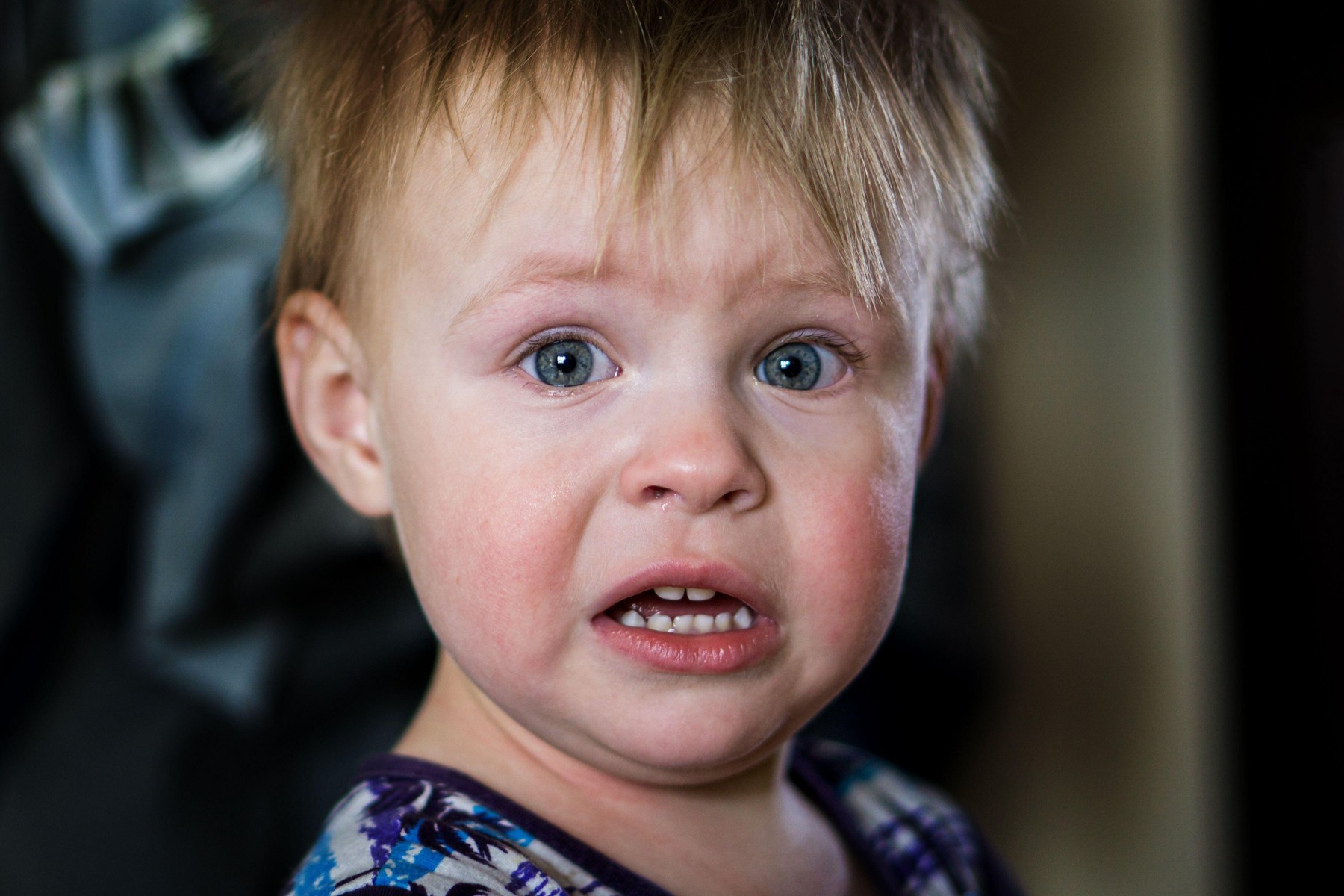 Closeup of a crying boy. Upset child