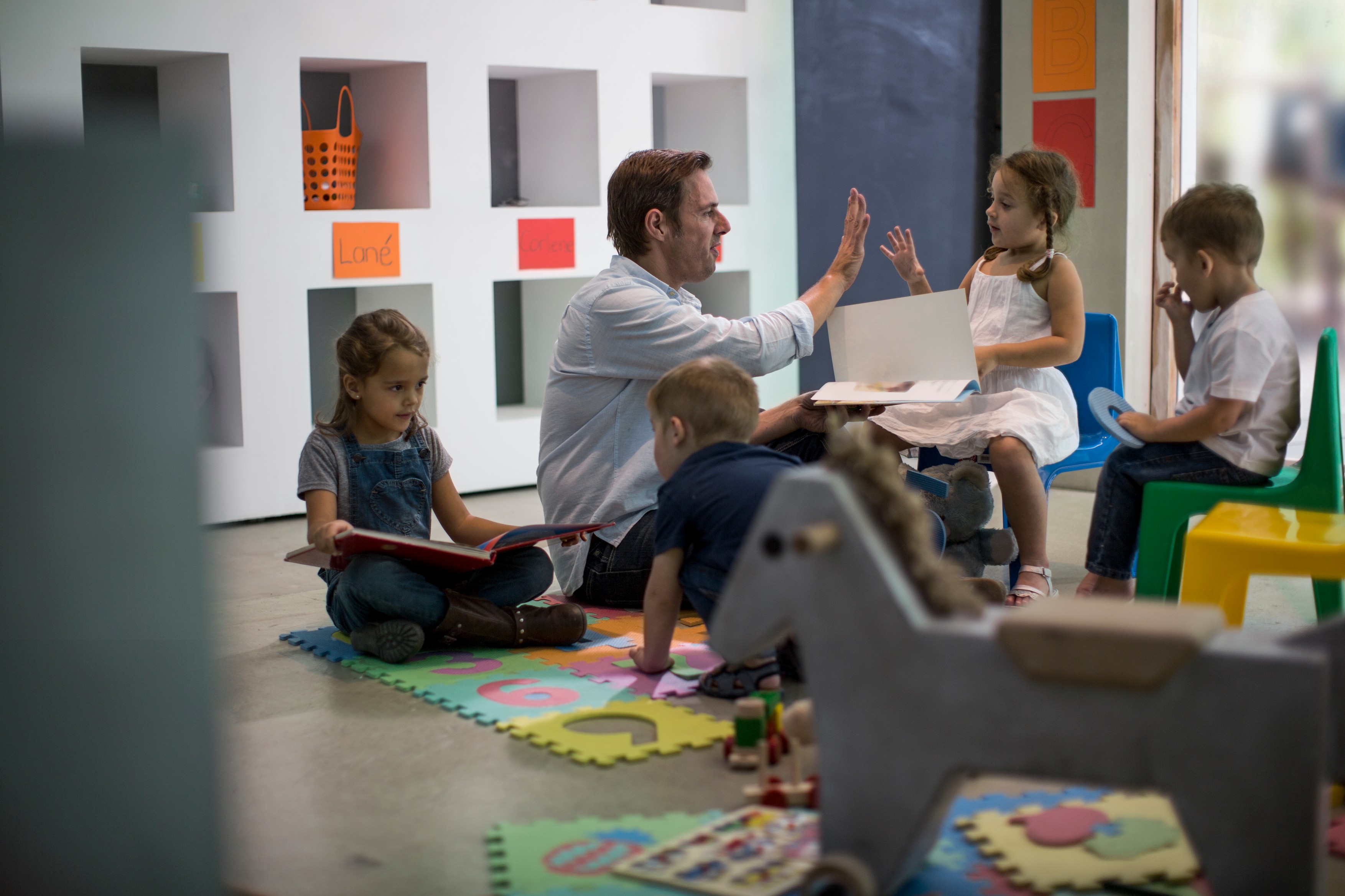 Teacher reading to children