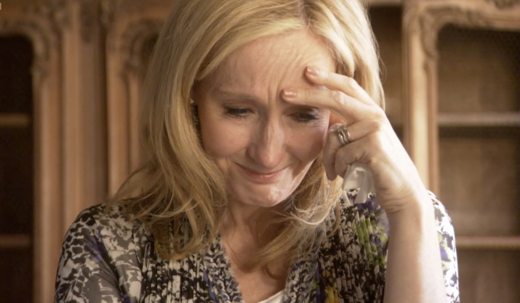 Rowling tears over family roots