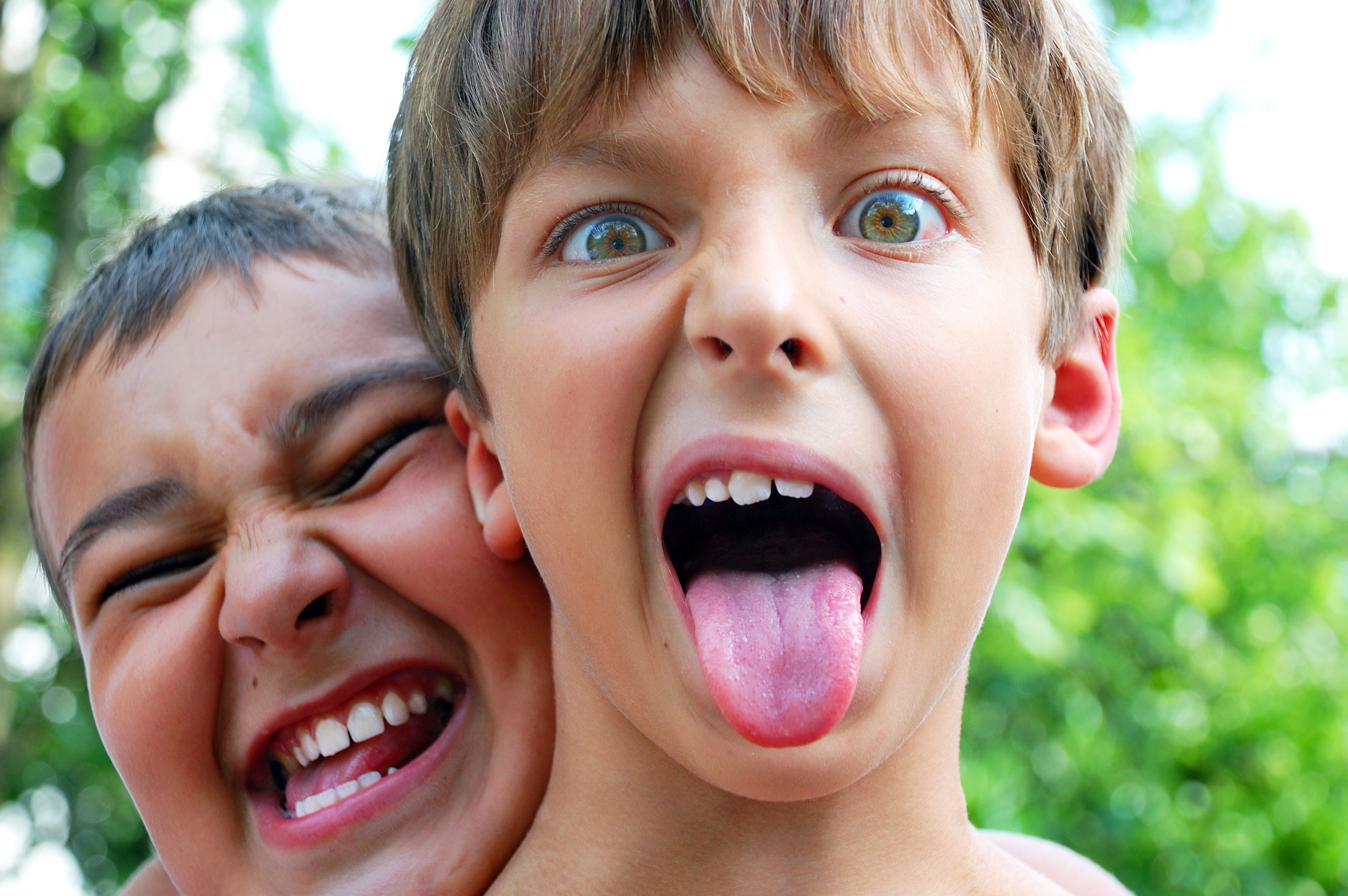 Two,Cute,Boys,Making,Crazy,Faces,Outdoor