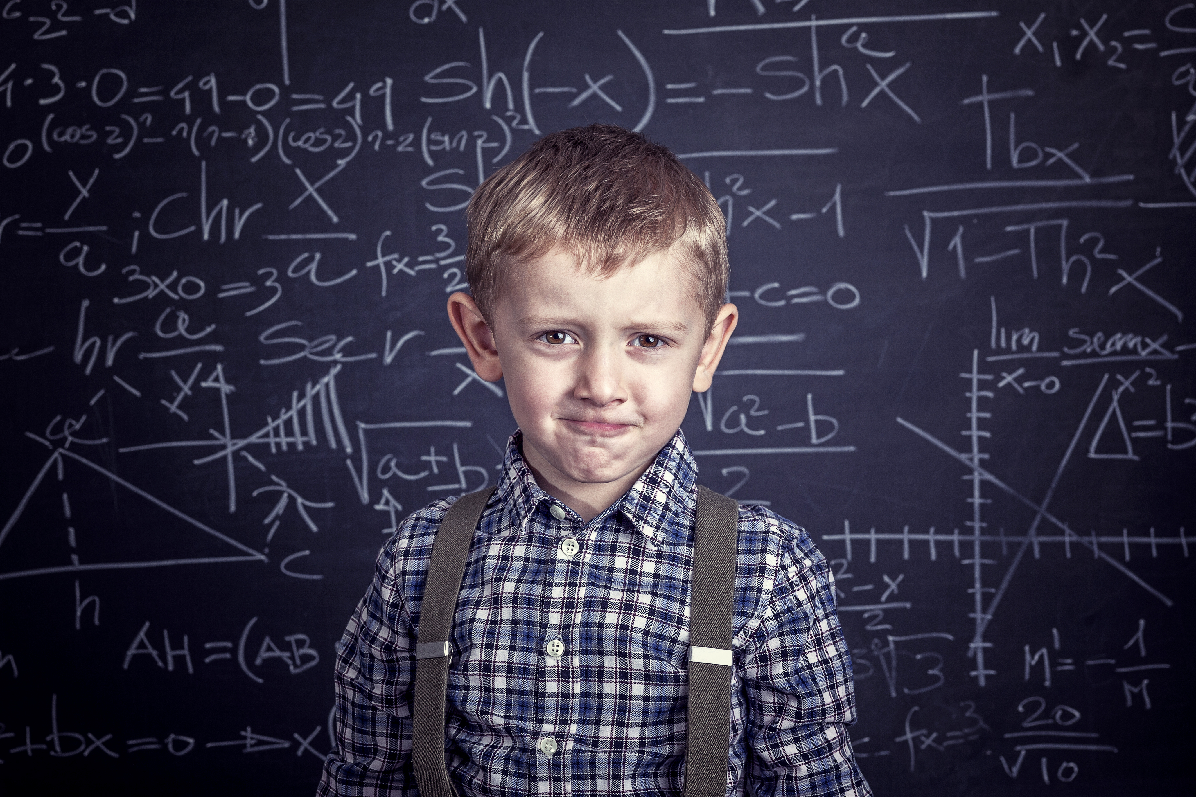 Caucasian,Young,Student,And,Blackboard,Background