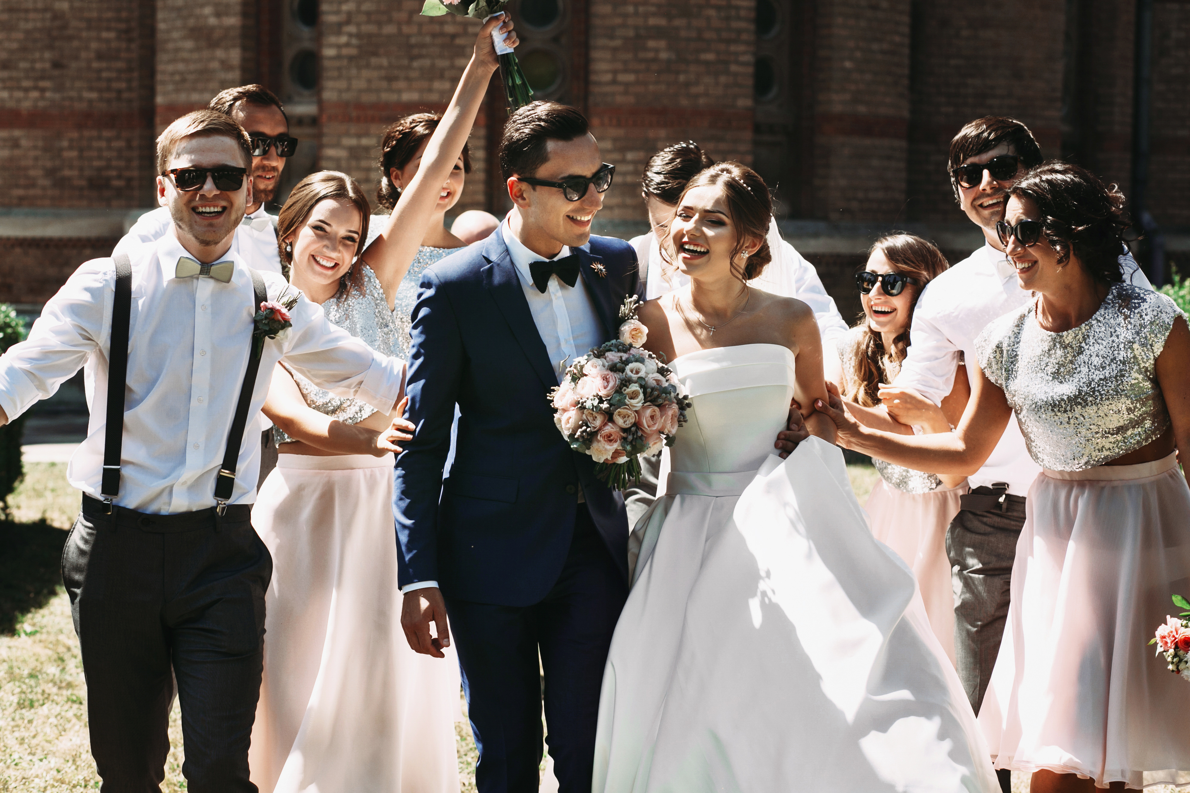 Newlywed,Couple,,Bridesmaids,&amp;,Groomsmen,Having,Fun,Outdoors