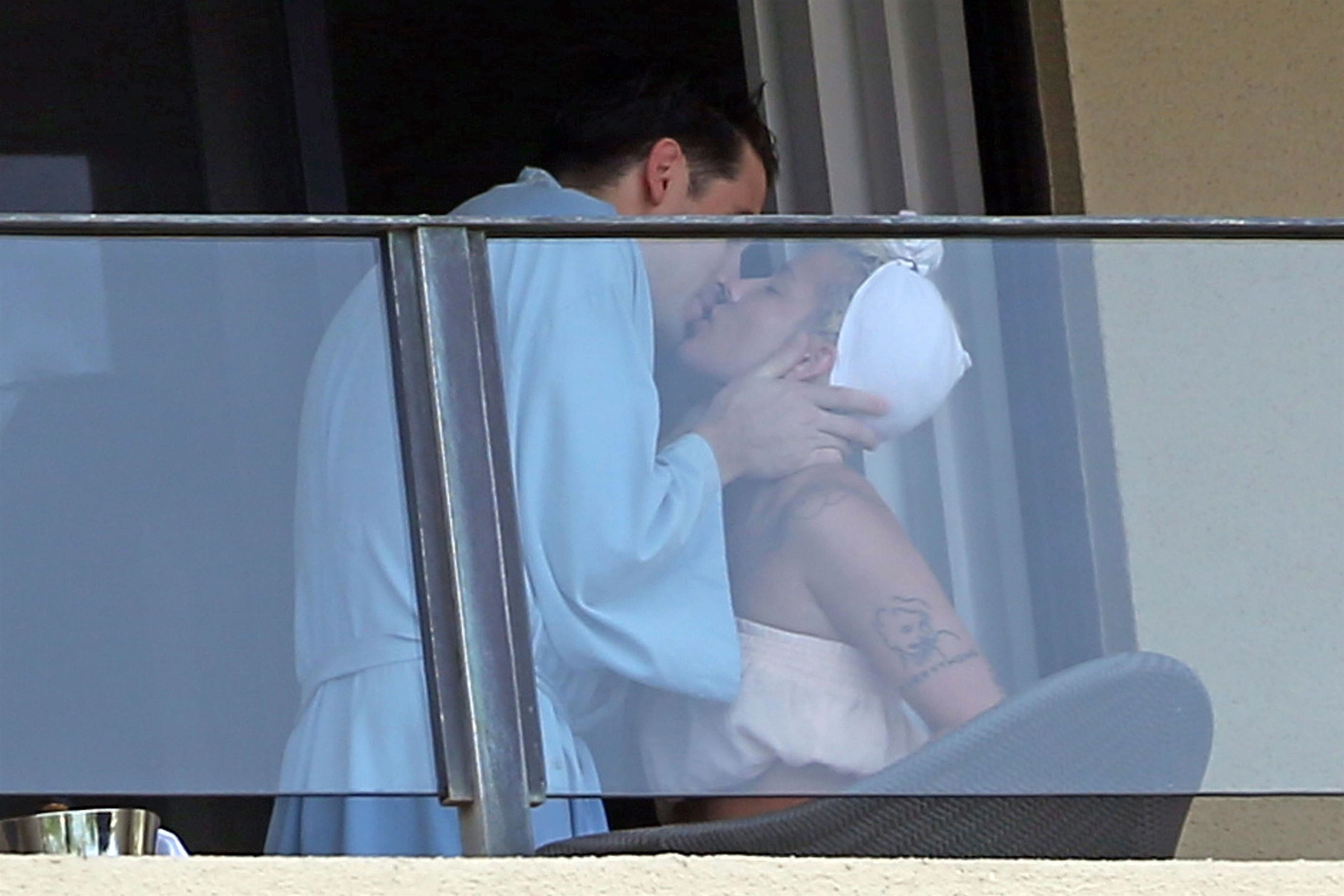 *EXCLUSIVE* G-Eazy and Halsey share an Easter Sunday kiss in Maui