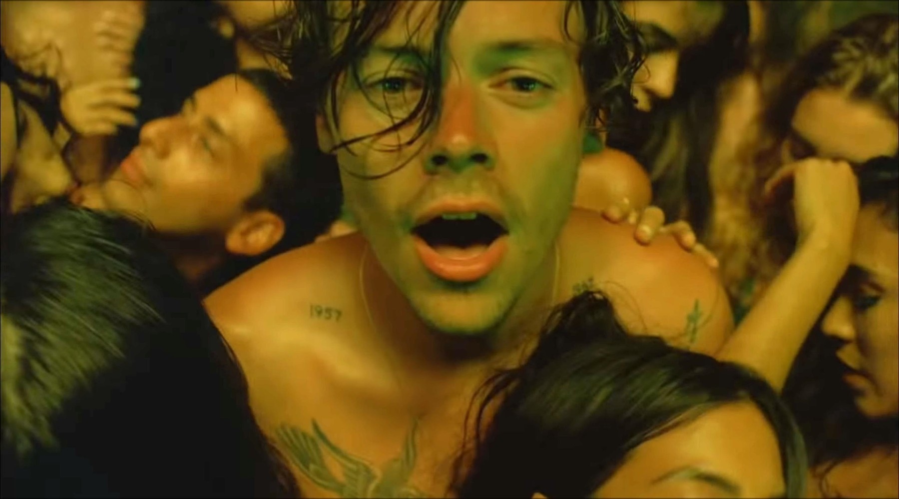 Harry Styles strips topless for x-rated orgy scenes in video for new single Lights Up