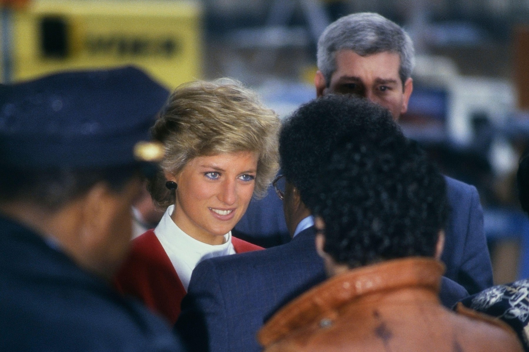 "Diana, Princess of Wales" surrounded by officials on her solo Royal visit to Harlem Hospital in New York city, to tour the hospital's AIDS pediatric ward. USA. Feb. 3, 1989