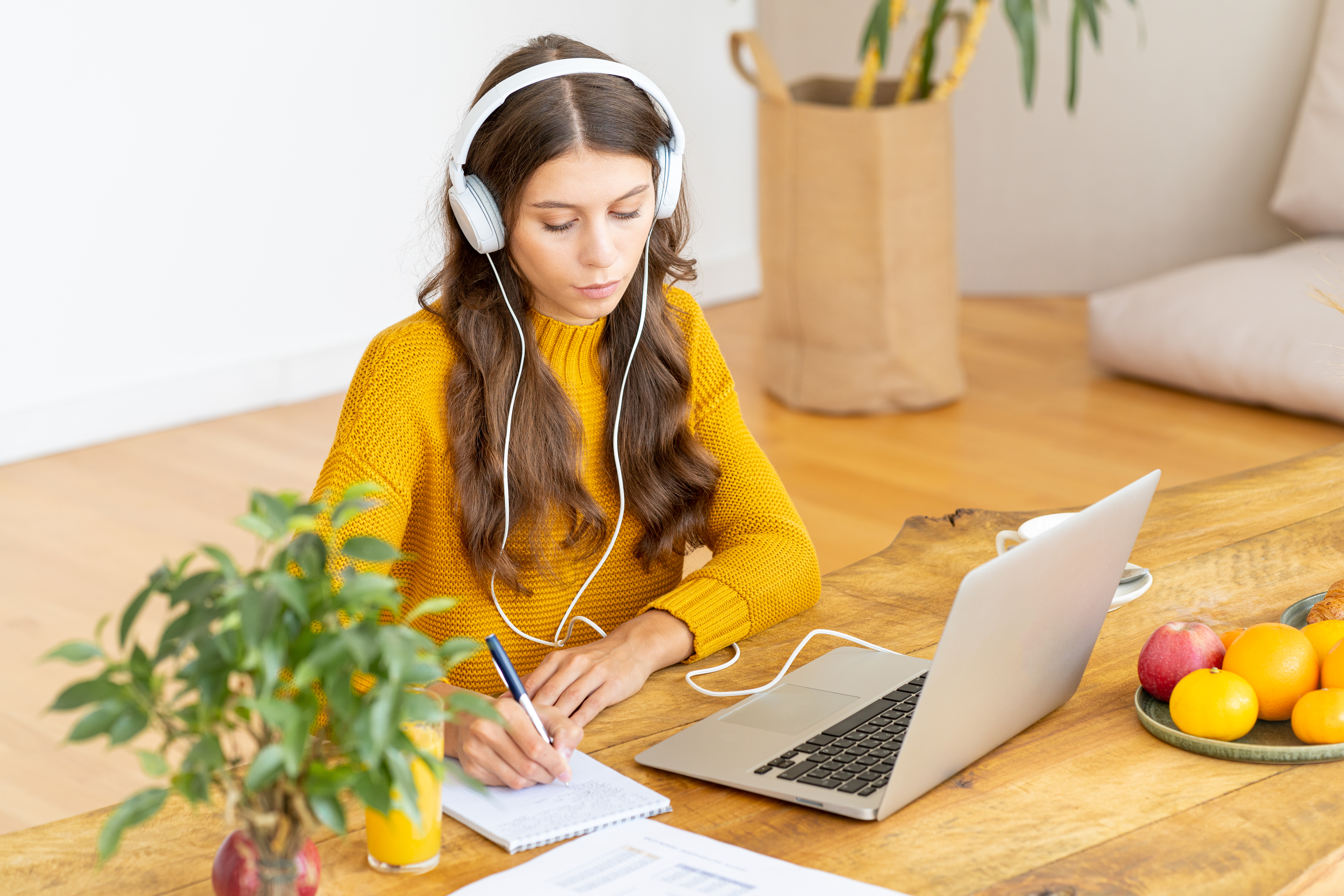 Happy,Female,In,Wireless,Headphones,Studying,Online,Course,,Using,Pc