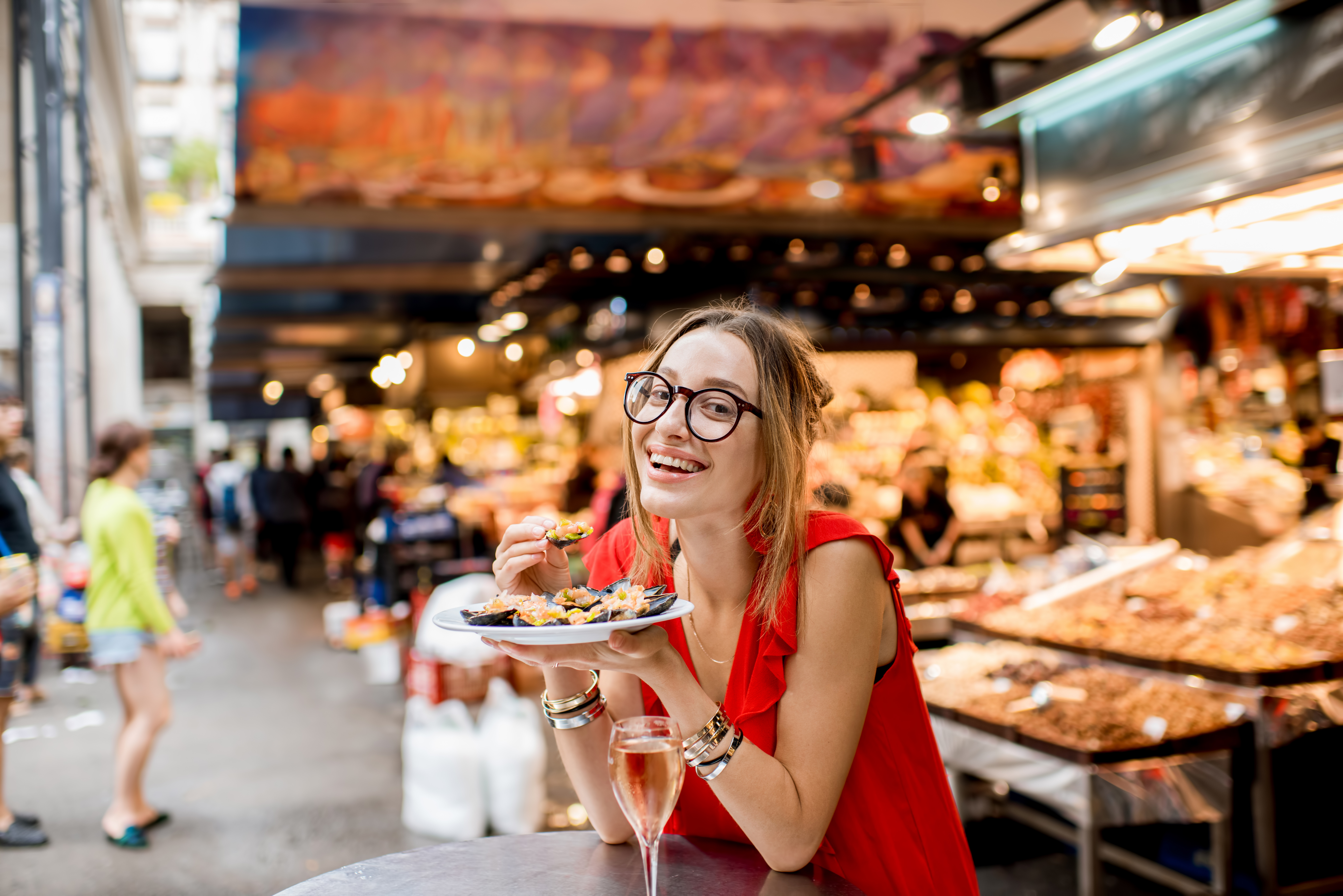 Young,Woman,In,Red,Dress,Having,Lunch,With,Mussels,And