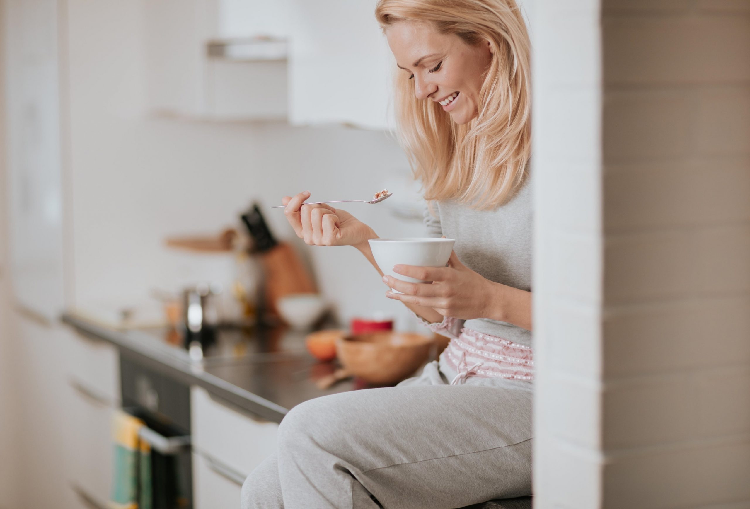 Beautiful blond  woman having heathy breakfast