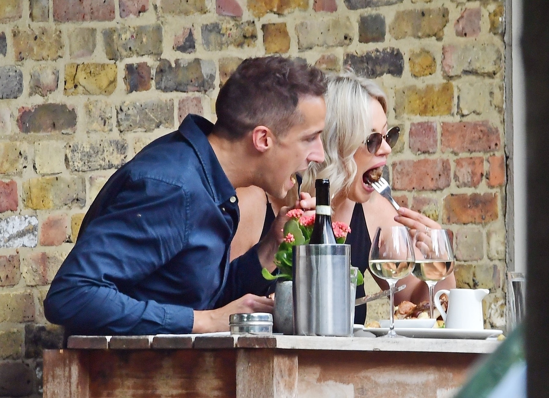 *EXCLUSIVE* WEB MUST CALL FOR PRICING  - British Actress Emily Atack out with her boyfriend Rob Jowers having a steamy kissing session outside a pub in London.