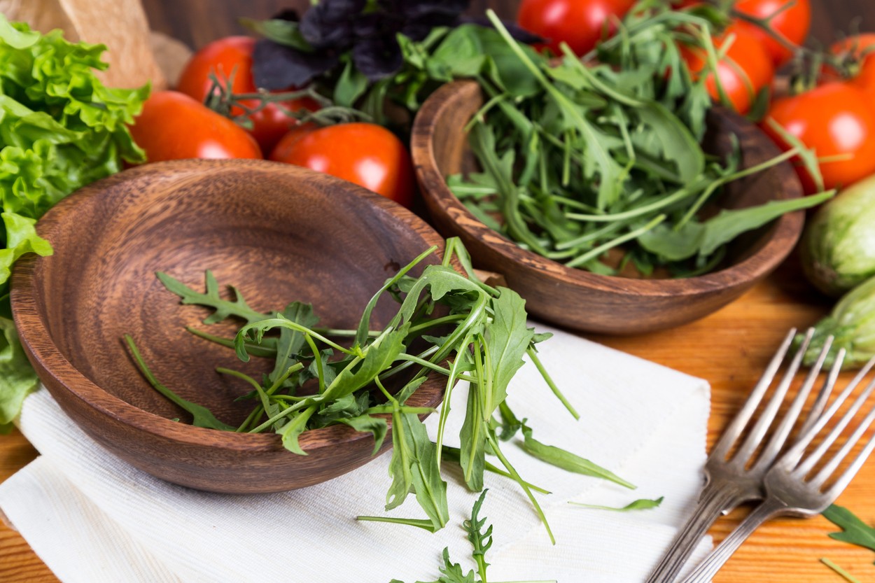 background from mixed vegetables with wood bowl