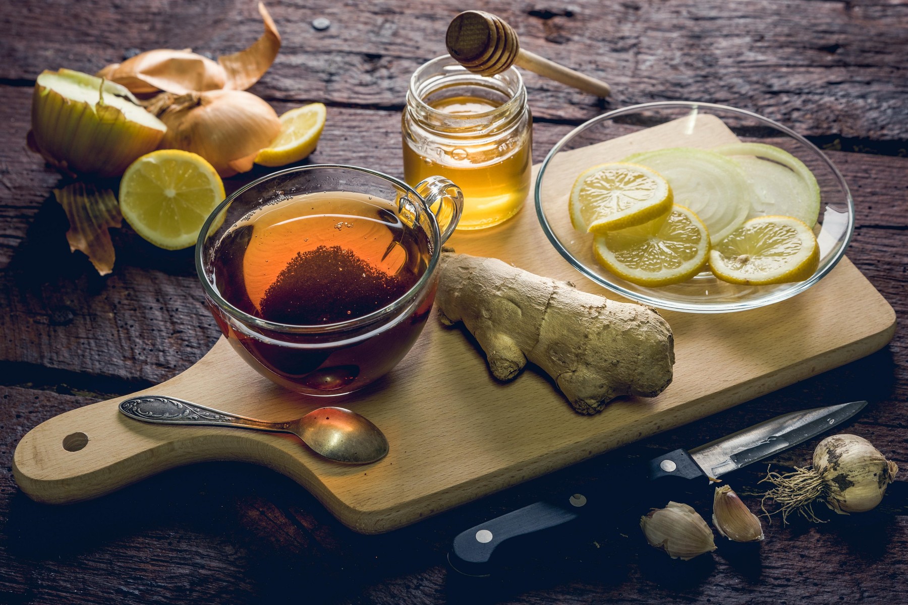 Natural medicines against flue and cold. Honey, lemon and garlic. Health and alternative medicine concept.