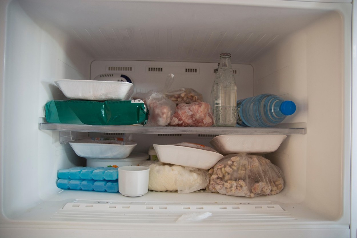 Refrigerator deep freezer section. Meat, vegetables and waters