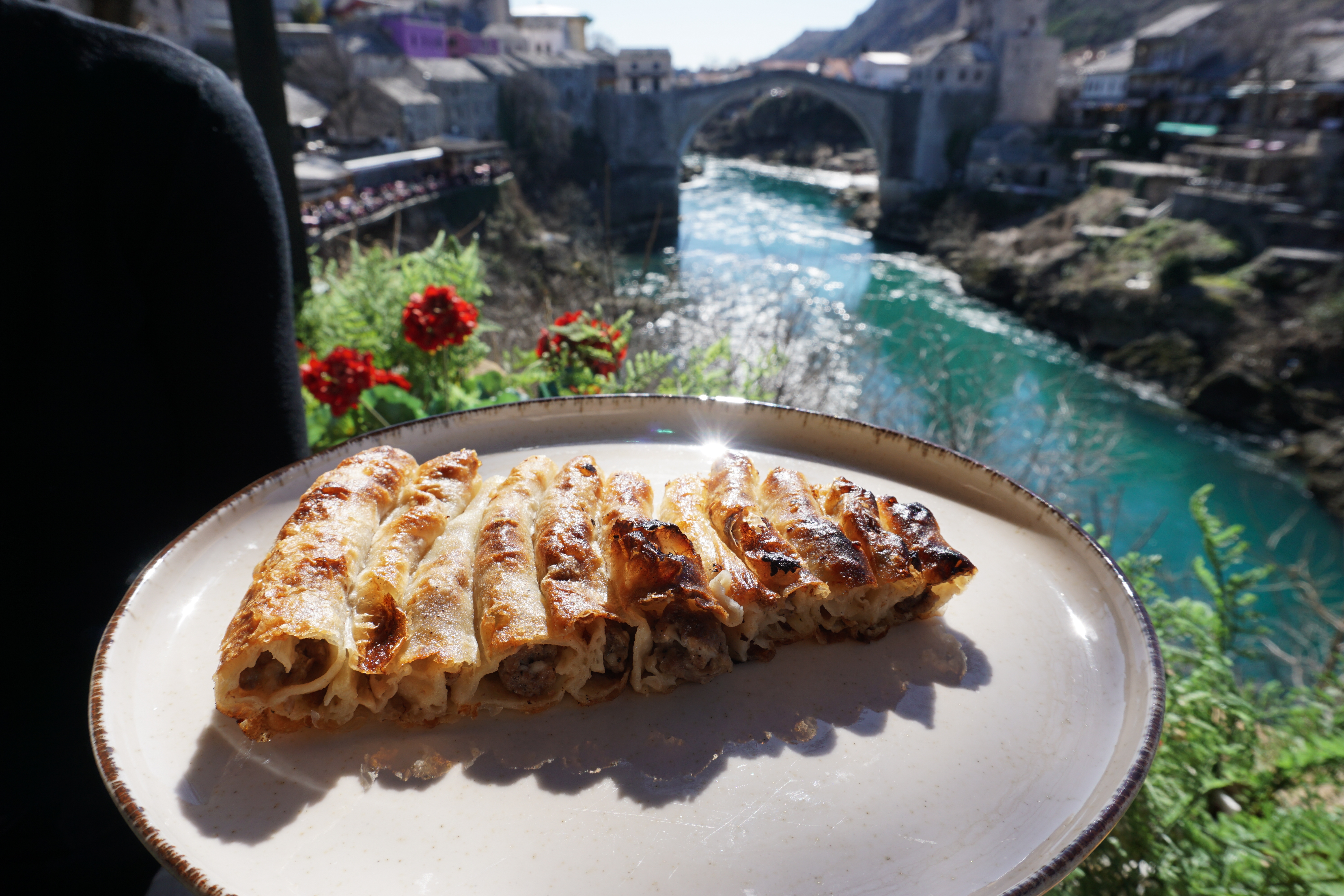 Bosnian,And,Balkans,Food,,Burek,Pie,With,Old,Bridge,View,mostar,