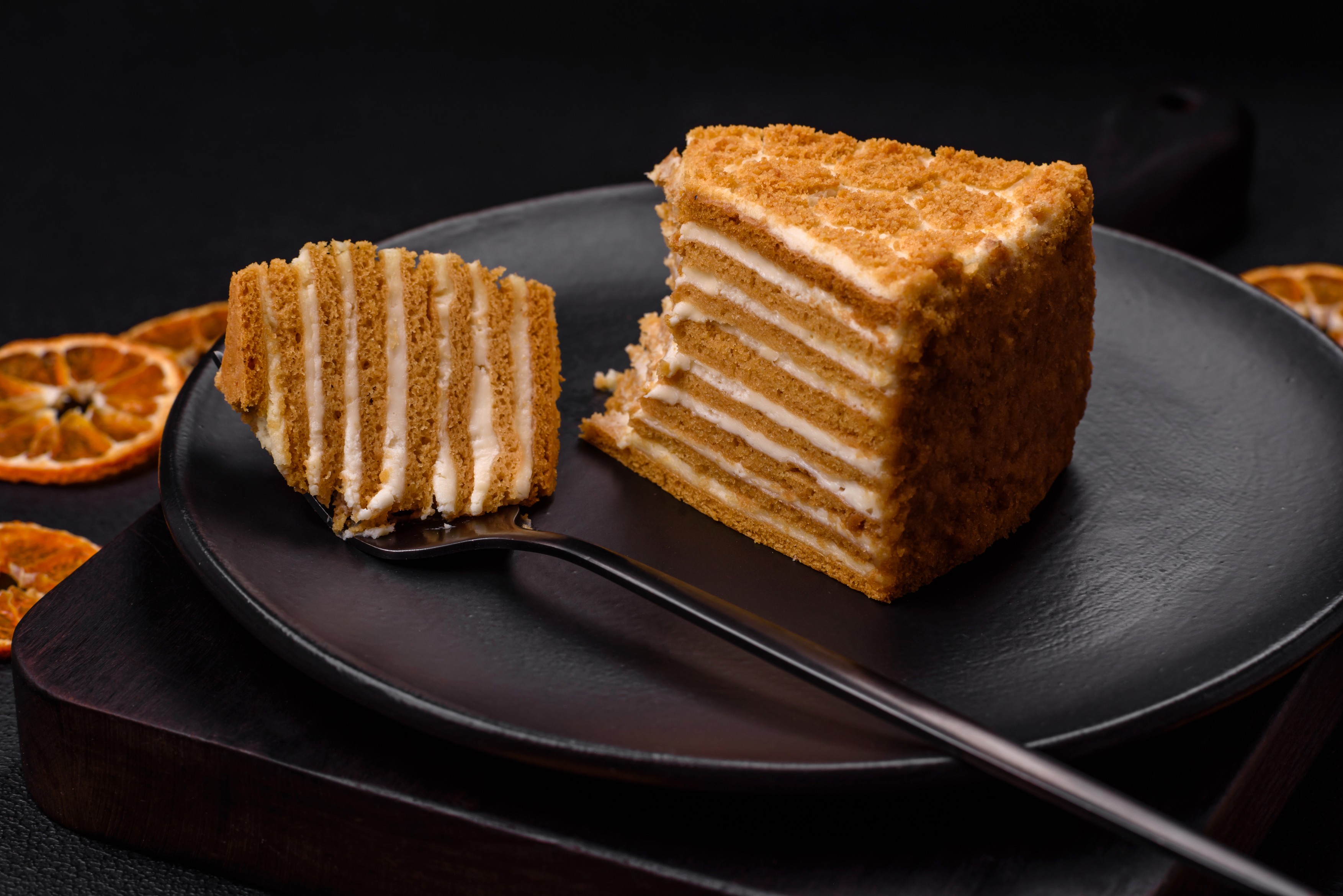 Delicious fresh sweet honey cake layer cake with white cream