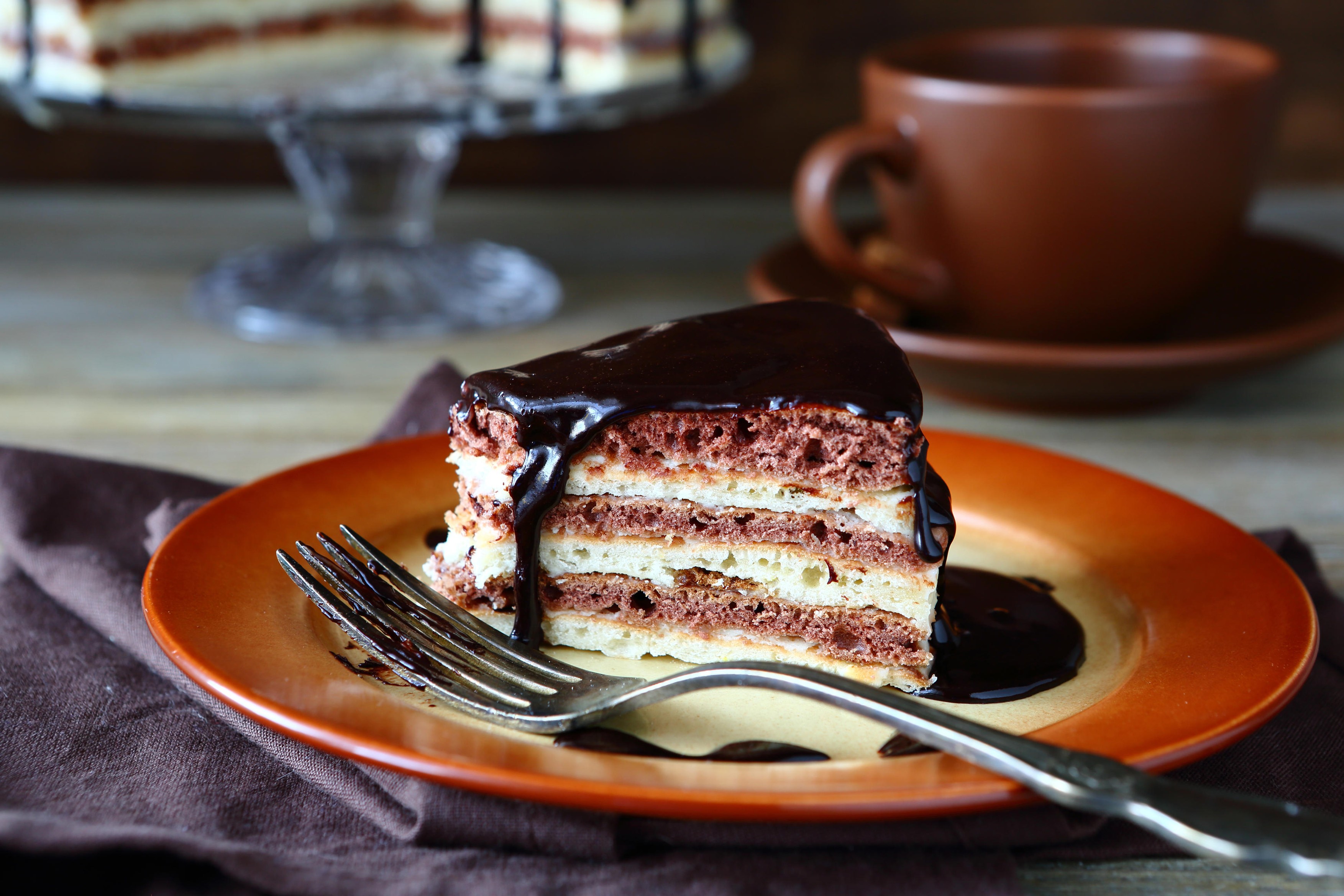 Piece of cake with hot chocolate, sweet food